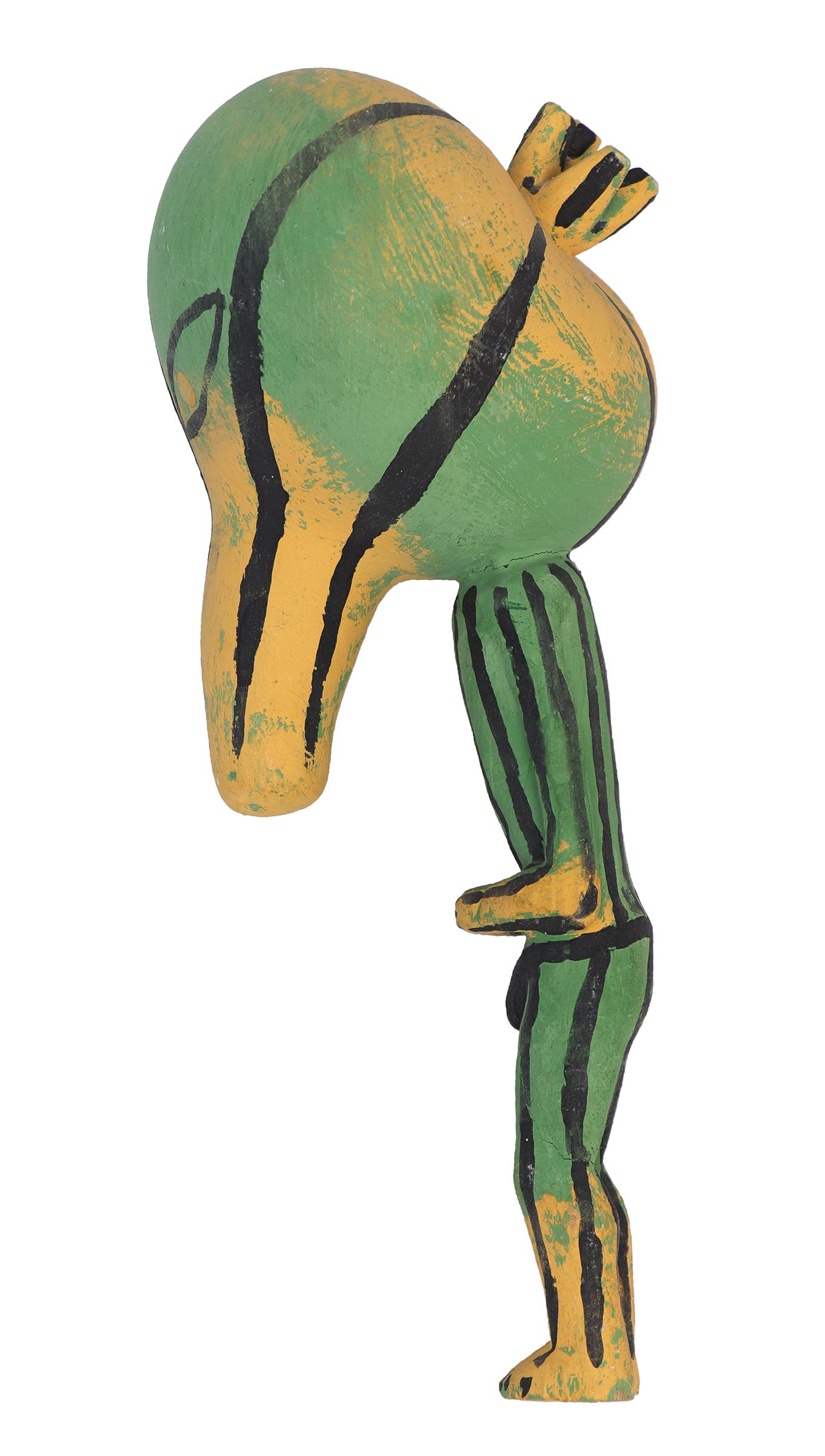 A traditional Patun (Squash) Katchina/Rattle created by a member of the Hopi (Pueblo) tribe circa 1940. This rattle is made of wood and painted with yellow, green, and black vegetal paints. Dimensions measure 10 x 4 ½ inches.

Custom display stand
