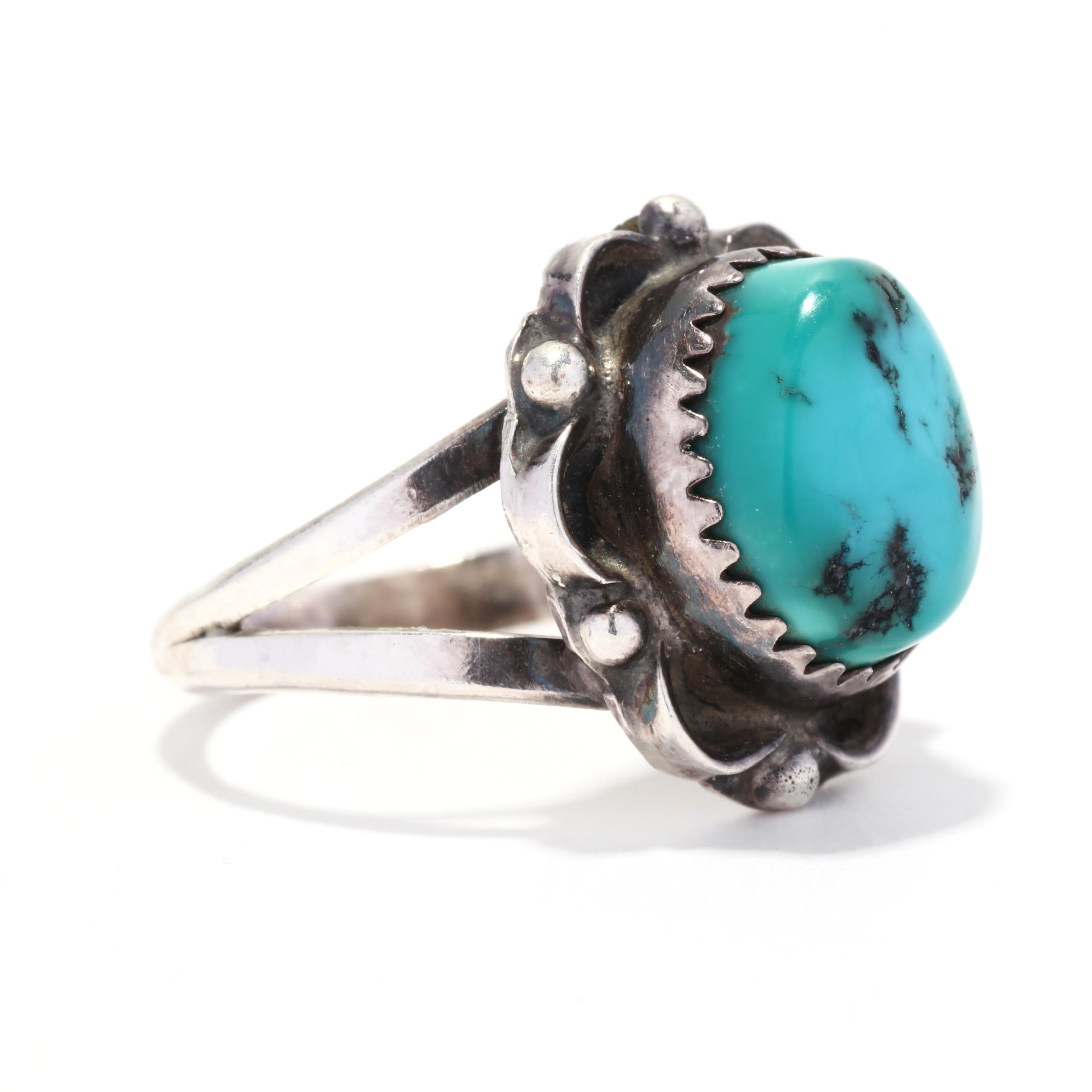 A Southwestern sterling silver and turquoise ring.  This turquoise flower ring features a central oval cabochon turquoise, in a scalloped setting.  It is stamped AMB Sterling.

Ring Size 6

Length: 8.4 mm

Ring off of finger: 5/8 in.

Weight: 3 dwt.