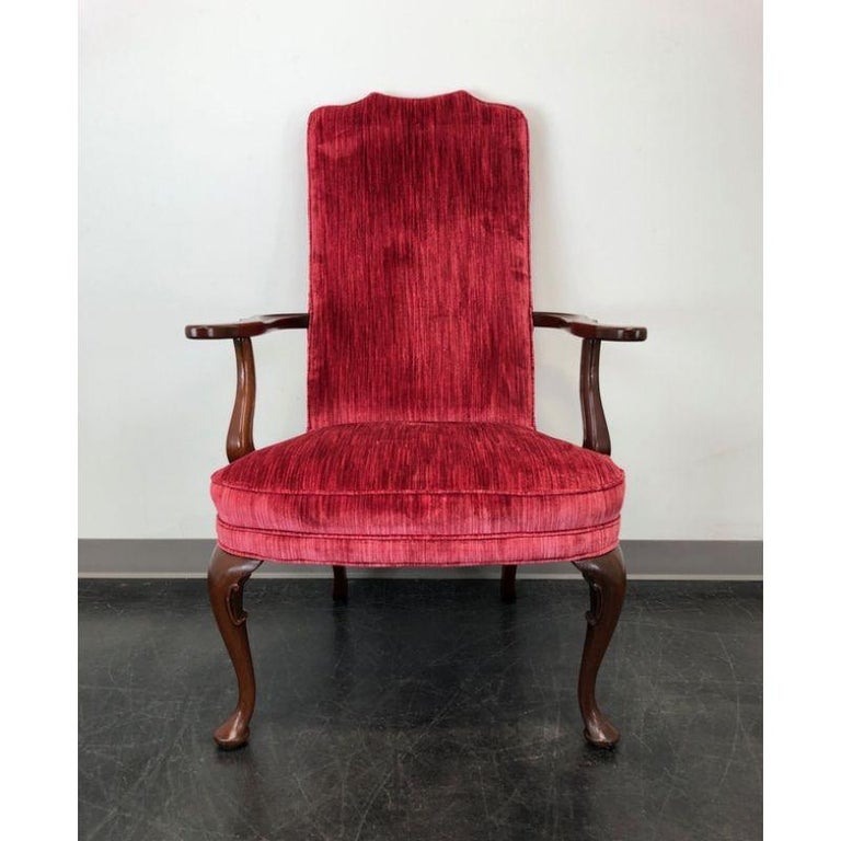 A vintage accent chair in the Georgian style by Southwood Furniture. Mahogany frame with fully upholstered seat and back. Red velvet upholstery. Cabriole legs, pad feet. Made in the USA, in the late 20th century.

Measures: Overall: 28.25 W 28.75 D