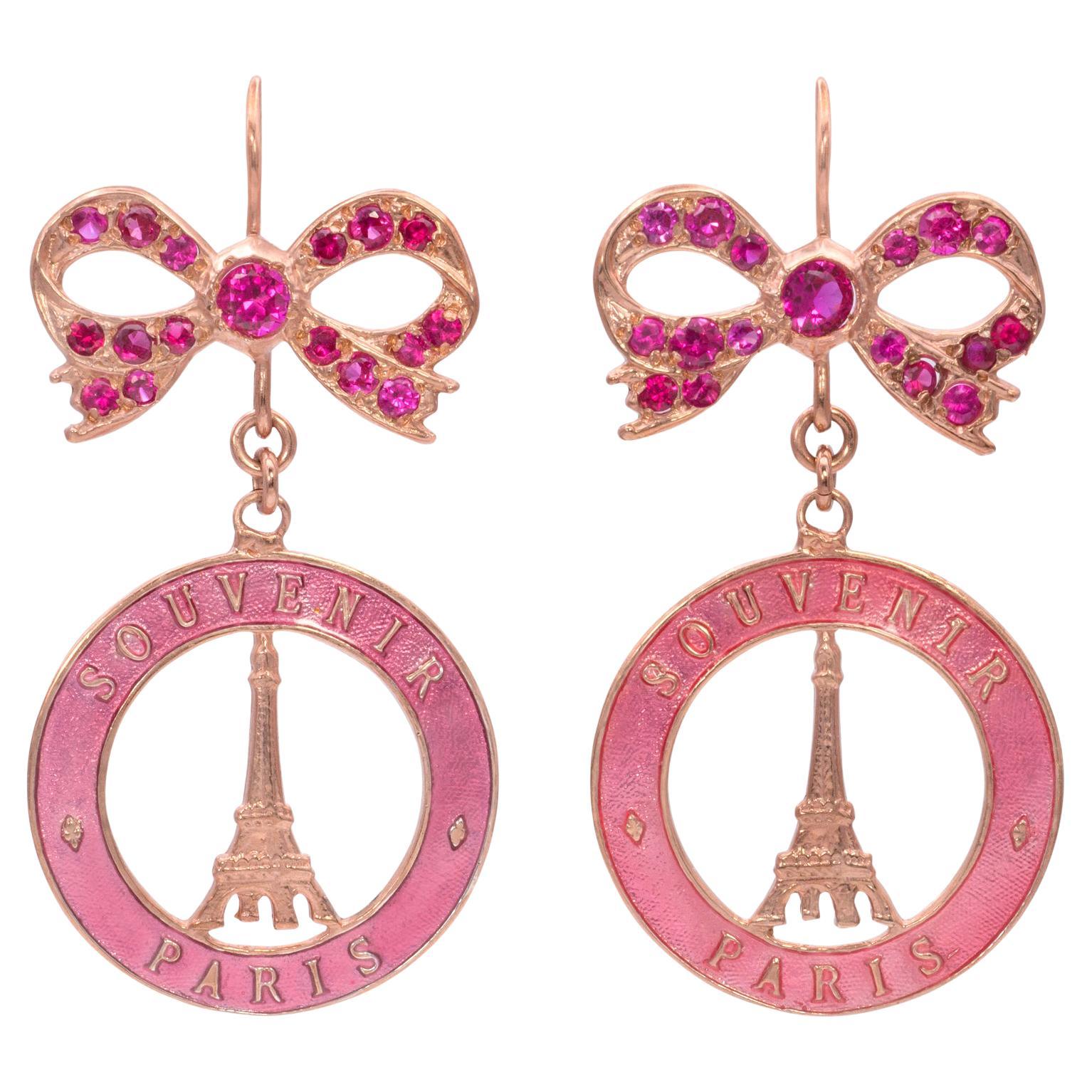 Souvenir de Paris Earrings with Swarovski Crystal bows. Dreaming of being in Paris, the city of love? These charming earrings will take you there the moment you put them on. Blue hand painted enamel on sterling silver the earring measures 1.15