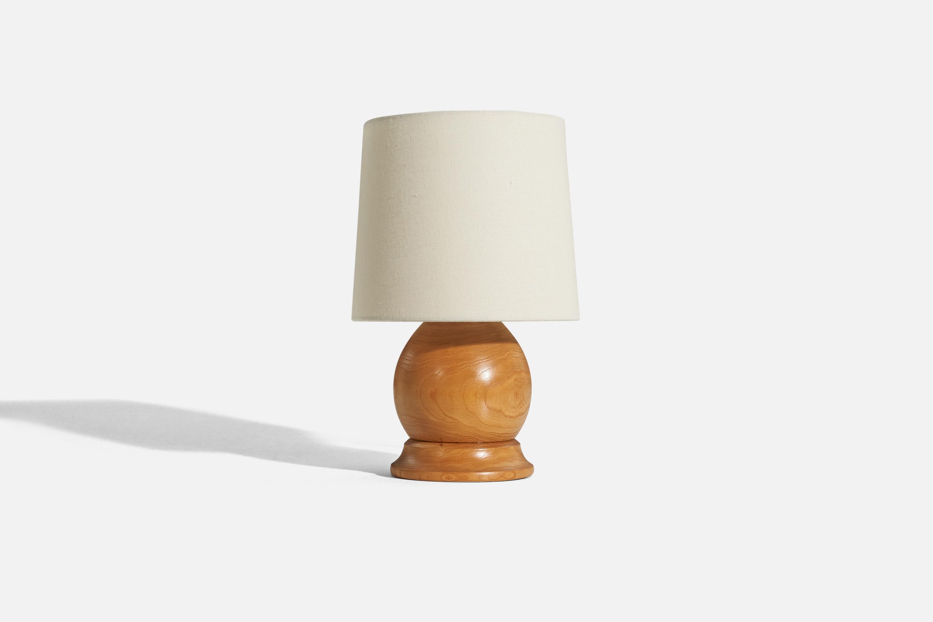 A solid pine table lamp designed and produced by a S.P. Slöjd, Sweden, 1970s.

Sold without lampshade. 
Dimensions of Lamp (inches) : 8.125 x 5.125 x 5.125 (H x W x D)
Dimensions of Shade (inches) : 7 x 8 x 7 (T x B x H)
Dimension of Lamp with