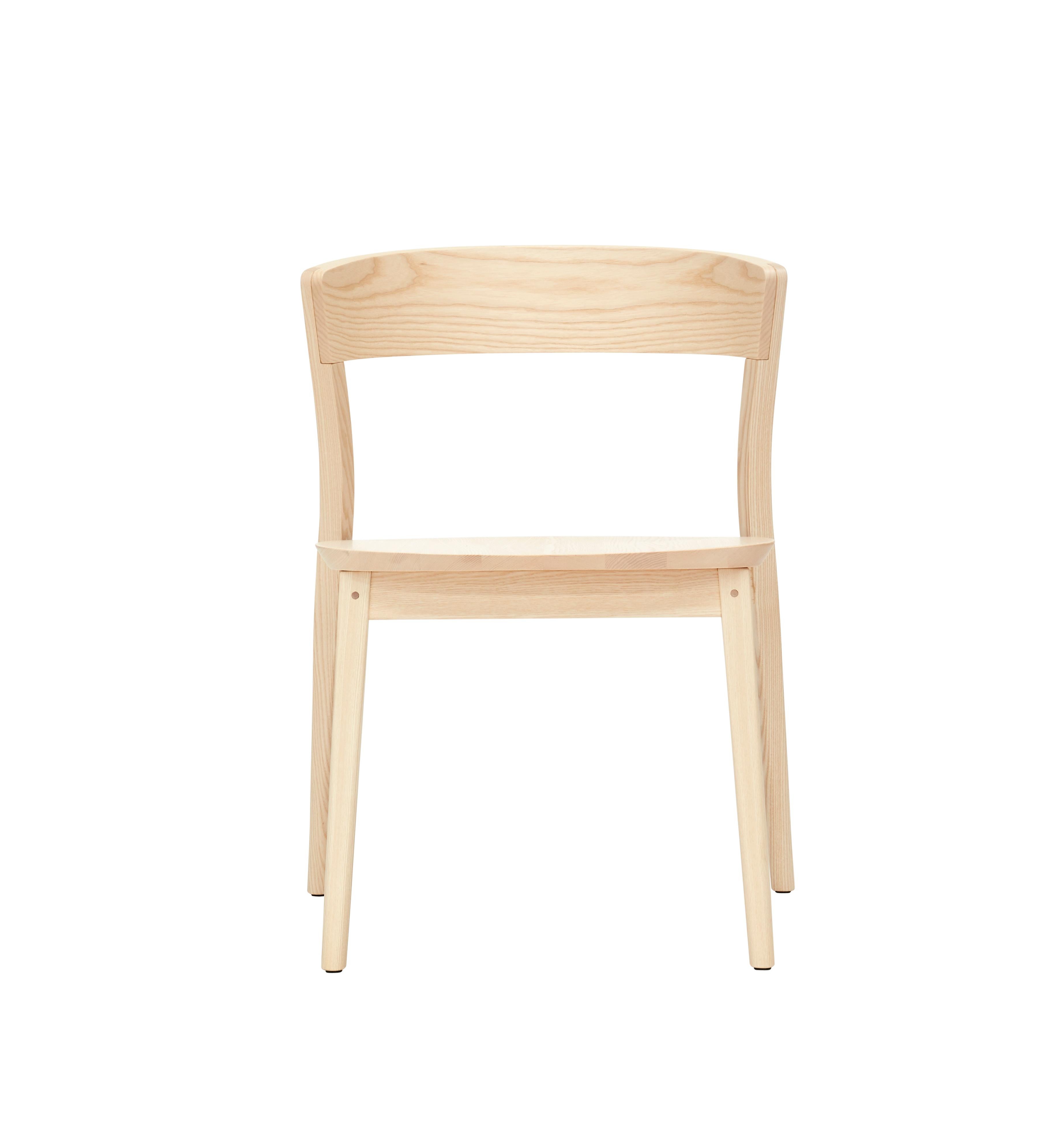 Contemporary interpretation of the Classic bistro chair, Clarke was designed for comfort. Made from solid ash, this sculpted piece is defined by fine details and subtle curves and angles. Fine craftsmanship highlights the sculpted solid timber seat