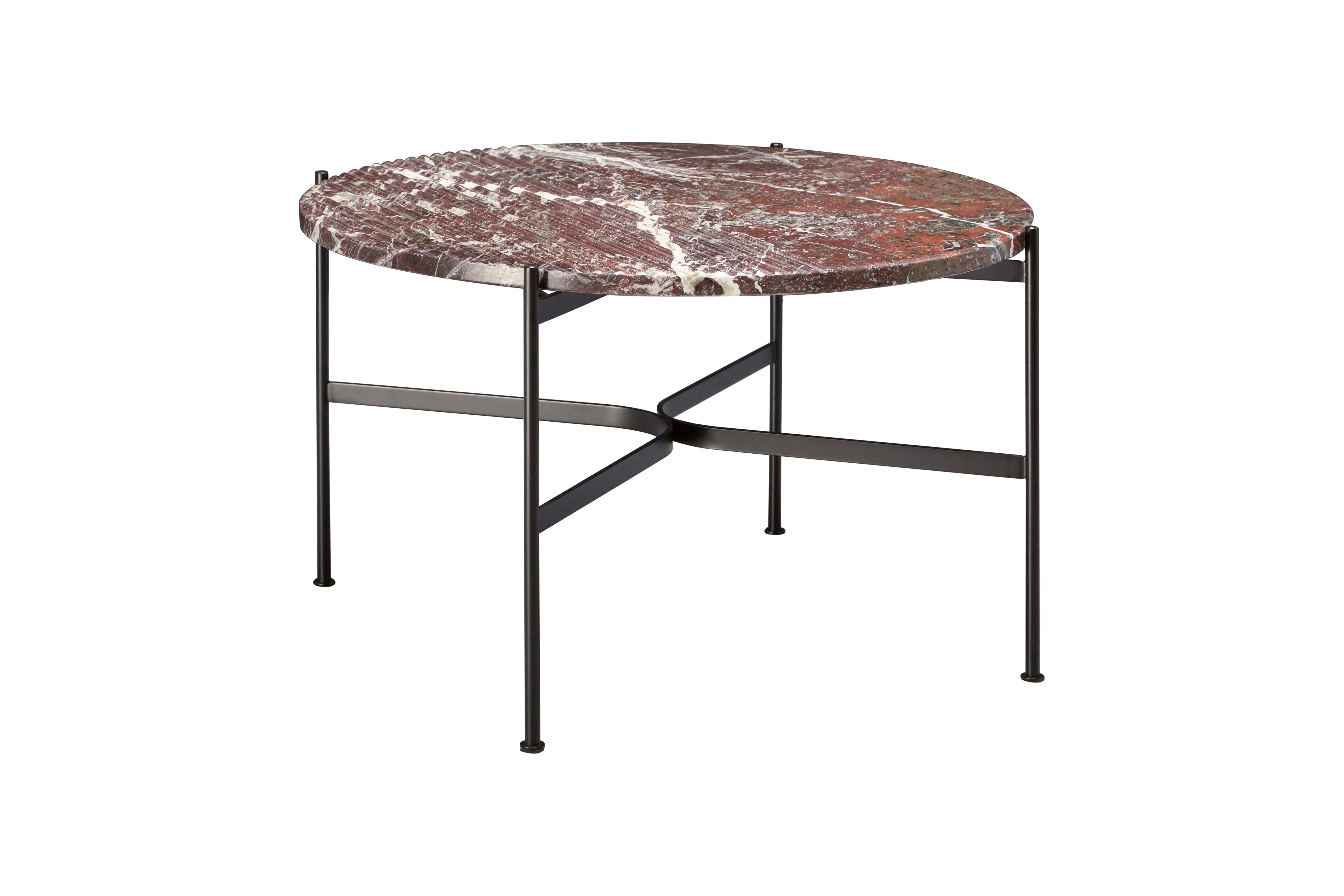 Offering a range of new materials and finishes, the addition of the medium Jeanette coffee table explores natural materials combined with intricate and sophisticated detailing.

Machined grooves on the table's surface create an elegant feature