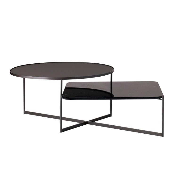 A series of modern, complementary tables that combine marble and glass, supported by a fine gauge steel frame that celebrates the beauty of industry. Utilitarian in approach, Mohana side and coffee tables are both functional and thoughtfully