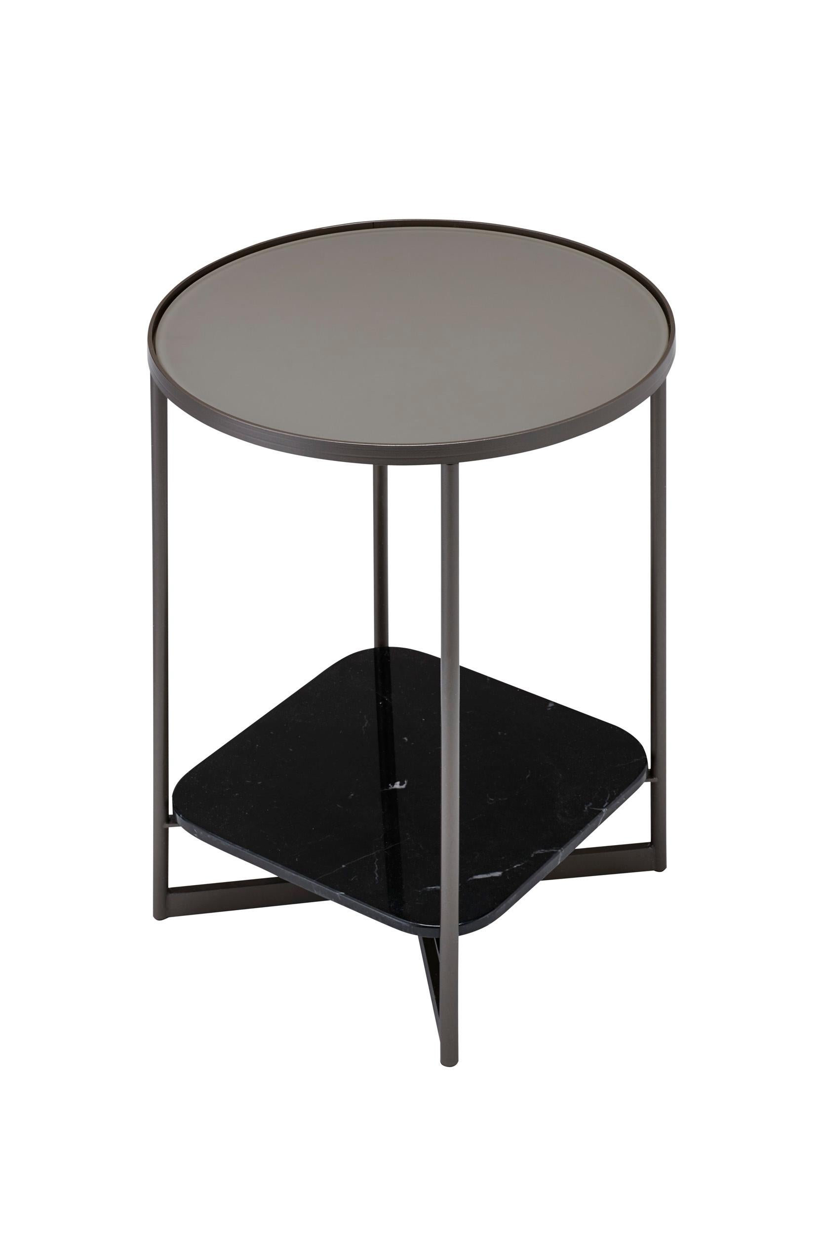 A series of modern, complementary tables that combine marble and glass, supported by a fine gauge steel frame that celebrates the beauty of industry. Utilitarian in approach, Mohana occasional tables are both functional and thoughtfully detailed.