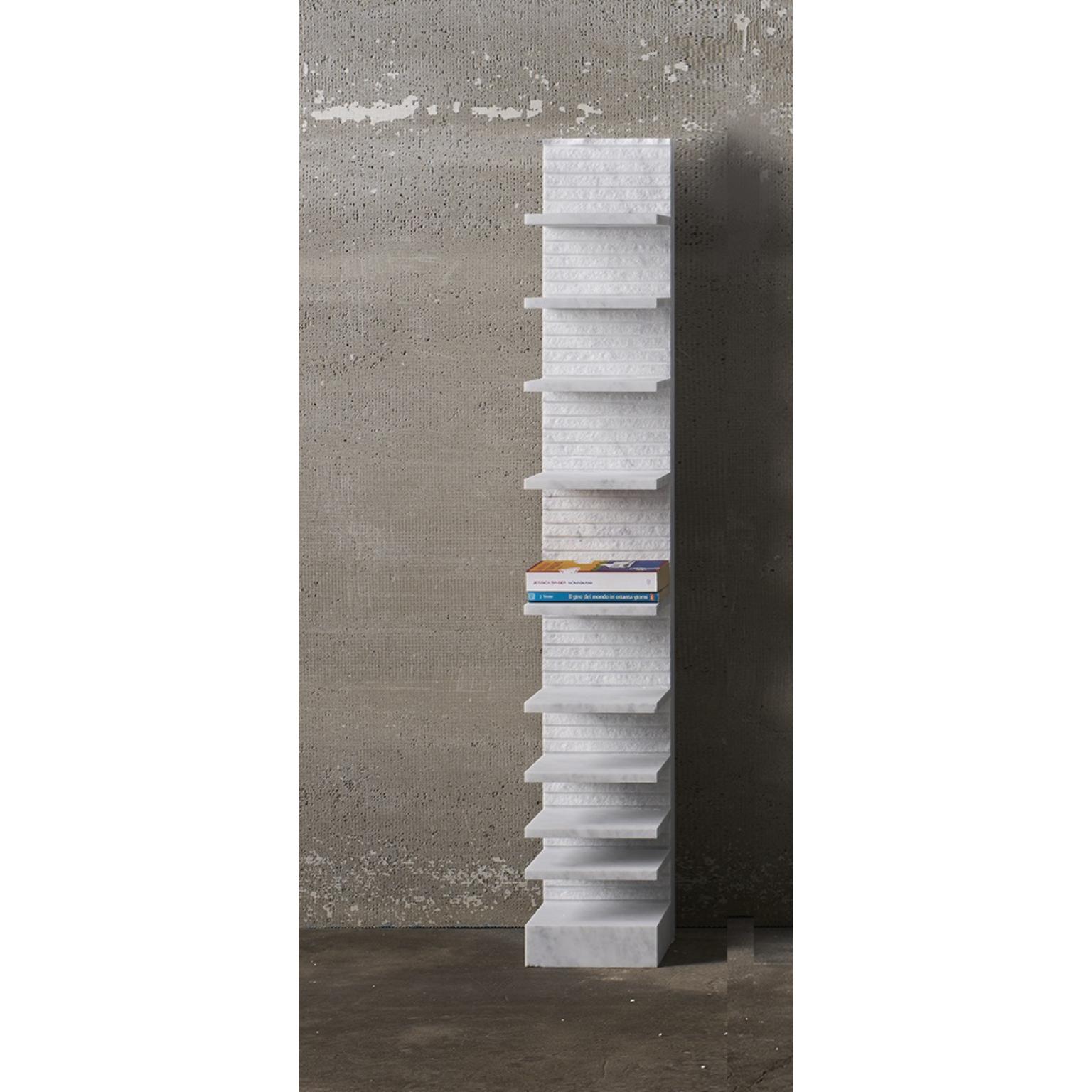 Spacco 120 Vertical Bookcase in Bianco Carrara Marble by Bufalini Marmi
Dimensions: D 29 x W 23 x H 120 cm. 
Materials: Carrara marble.

Available in five different size options and two marble options: Carrara and Pietra Lavica. Prices may vary.