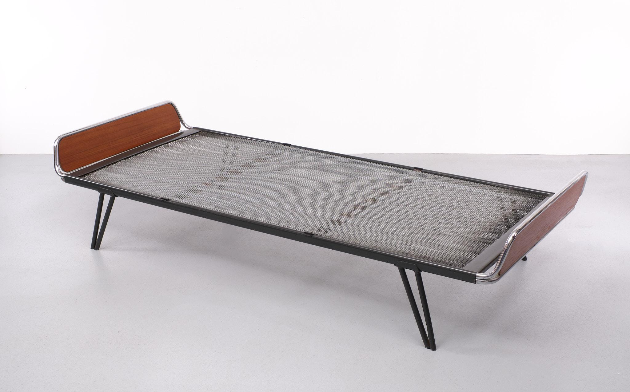 Very nice Day bed comes with its typical spa ace mattress .Teak with Chrome
head board  .Grey Metal Removable legs . Nice spare bed or Daybed  

Please don't hesitate to reach out for alternative shipping quote