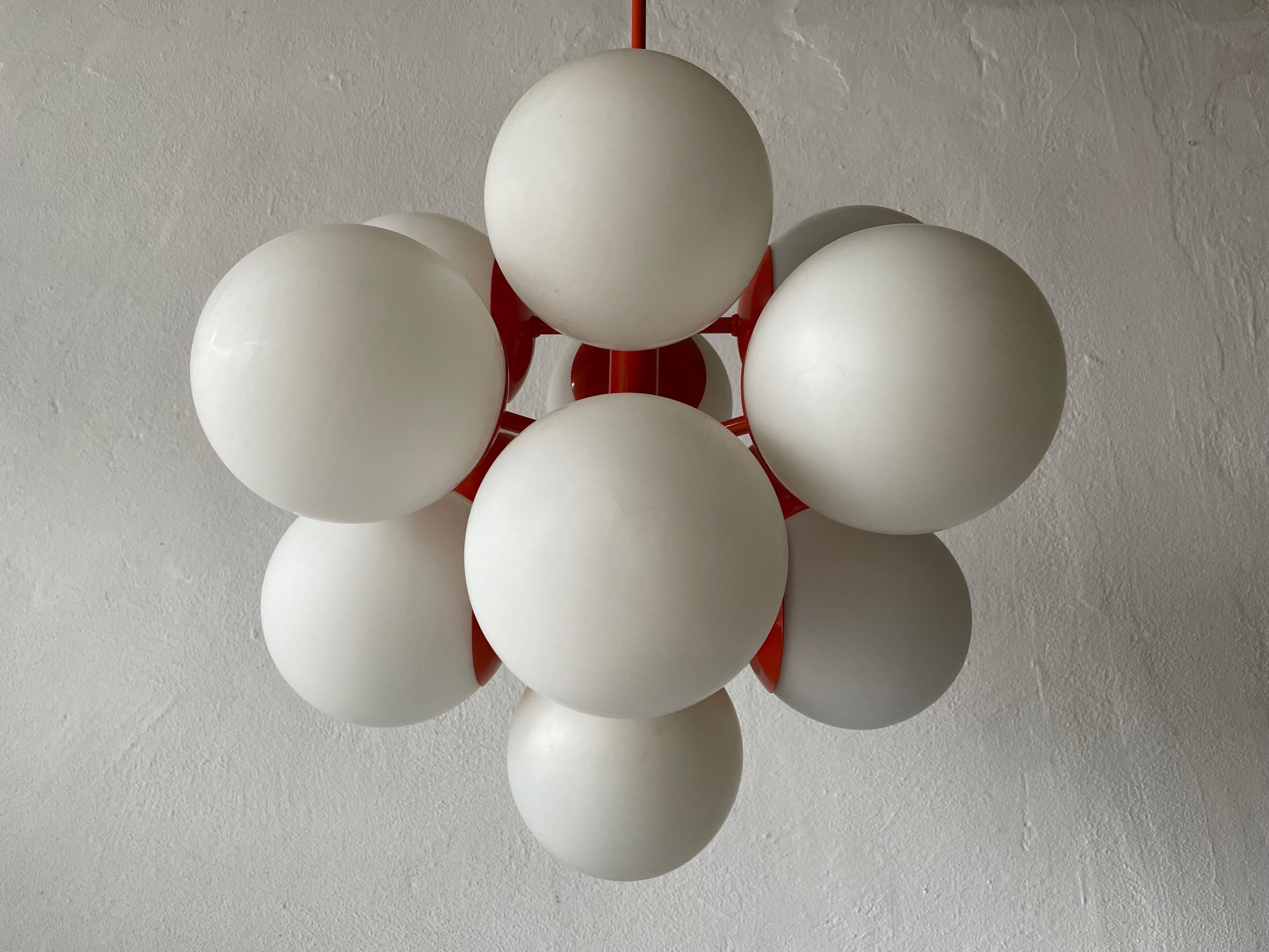 Space Age 13 Balls Orange Chandelier by Kaiser Leuchten, 1970s, Germany

Fantastic 3 opal ball glass atomic age pendant lamp

Lampshade is in good condition and very clean. 
This lamp works with 13 x E14 light bulb. 
Wired and suitable to use