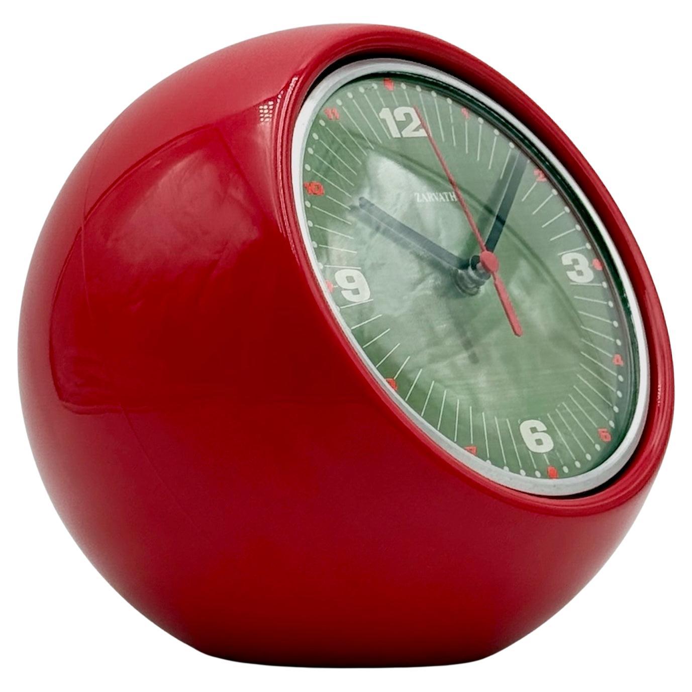 Reloj de diseño de los años 70 de la Era Espacial con diseño orbital rojo - Decoración de sobremesa vintage