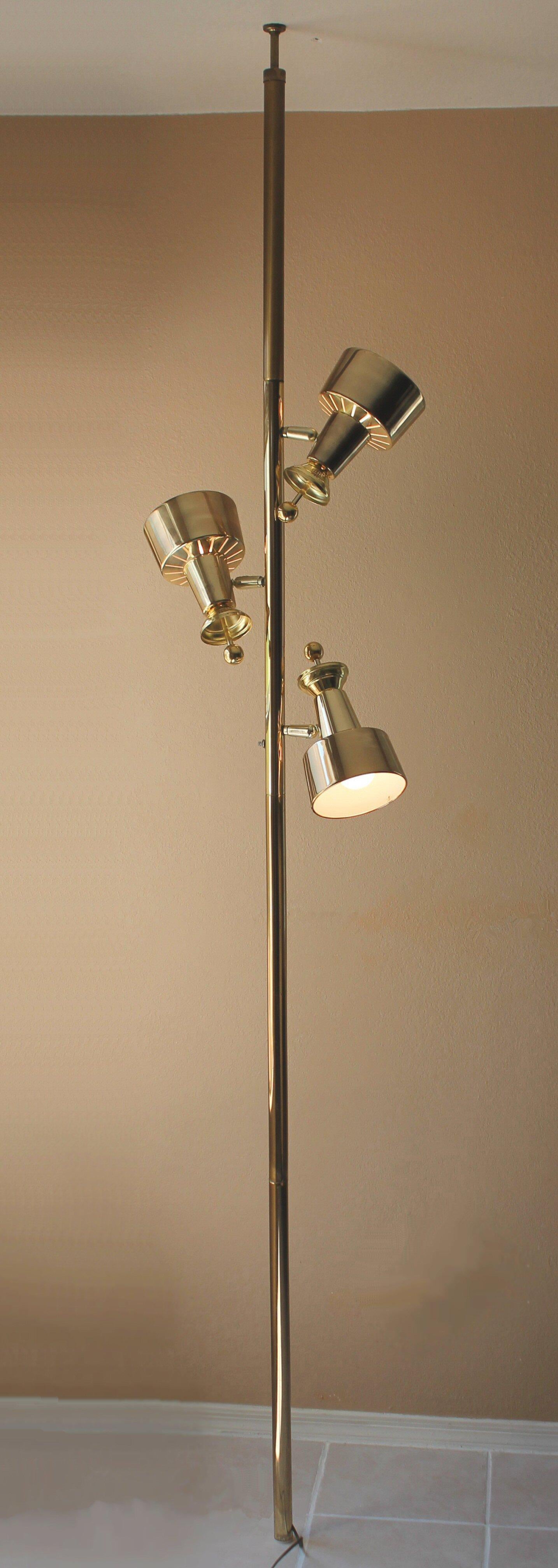 ICONIC!


SPACE AGE
MID CENTURY MODERN
GLEAMING BRASS
TENSION POLE LAMP!


Incredible Quality!

In the manner of Stiffel designs.


CIRCA 1959-60

( FITS 8 - 8.5 FT. CEILING )

Welcome to the Future!  

This is perhaps the most sensational Jetsons