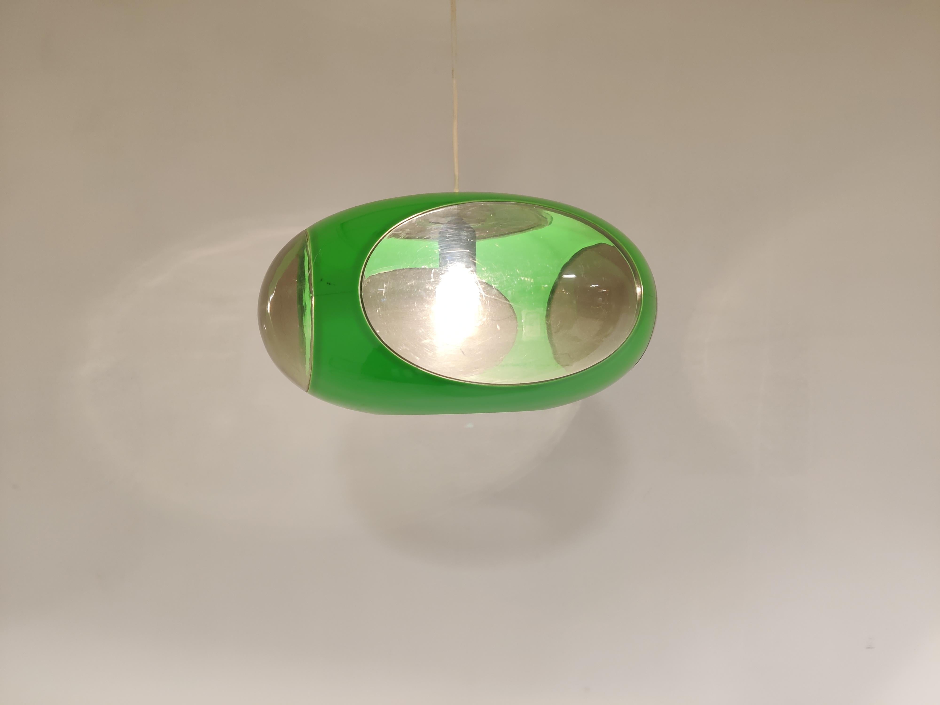 Mid century Space Age 'bug eye' or ufo pendant light by Massive.

The lamp is mostly referred to as Luigi Colani design but is not correct. These where produced in Belgium by a lighting company called Massive.

Nevertheless it is a great