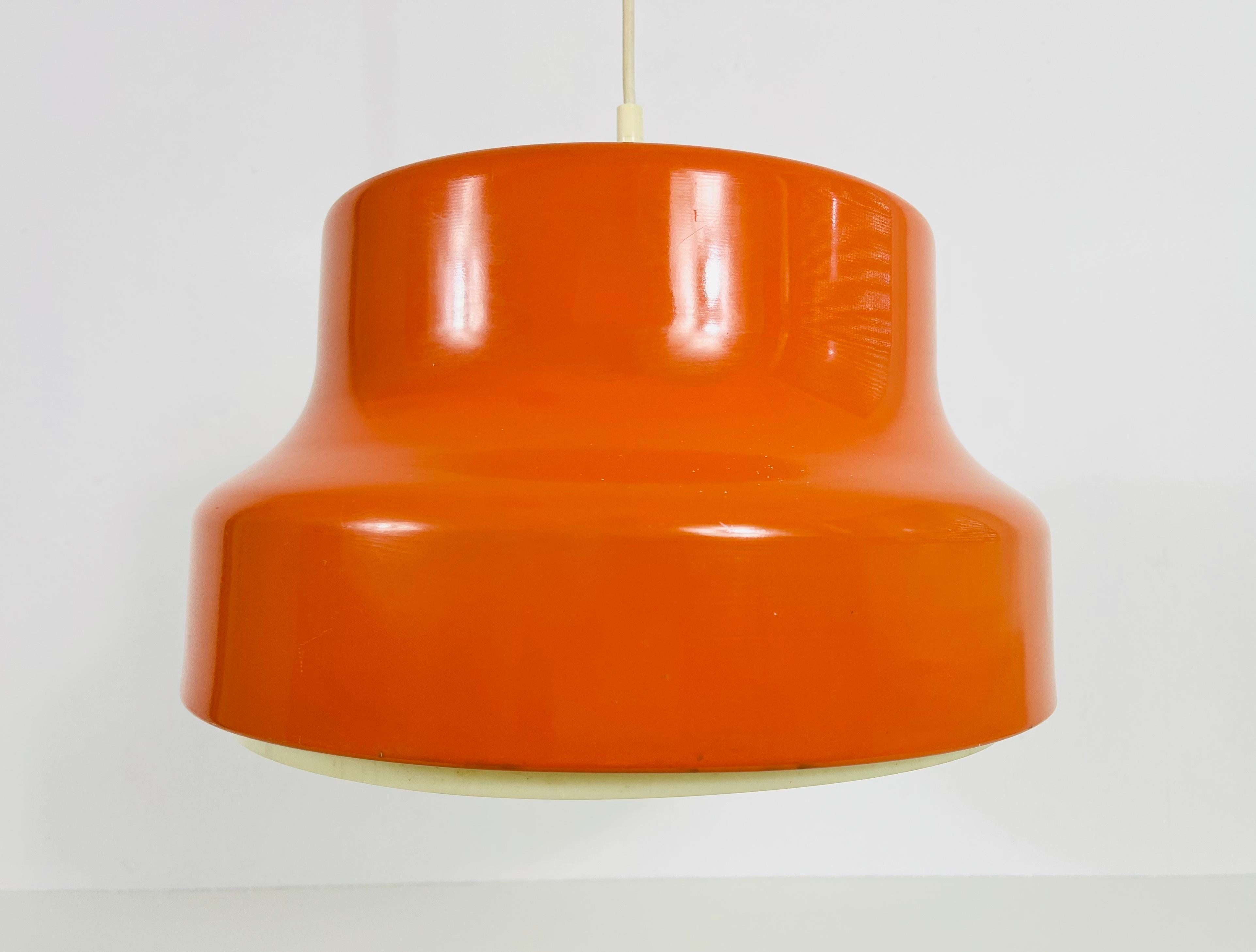 Space Age Bumling Orange Pendant Lamp, Germany, 1970s In Good Condition For Sale In Hagenbach, DE