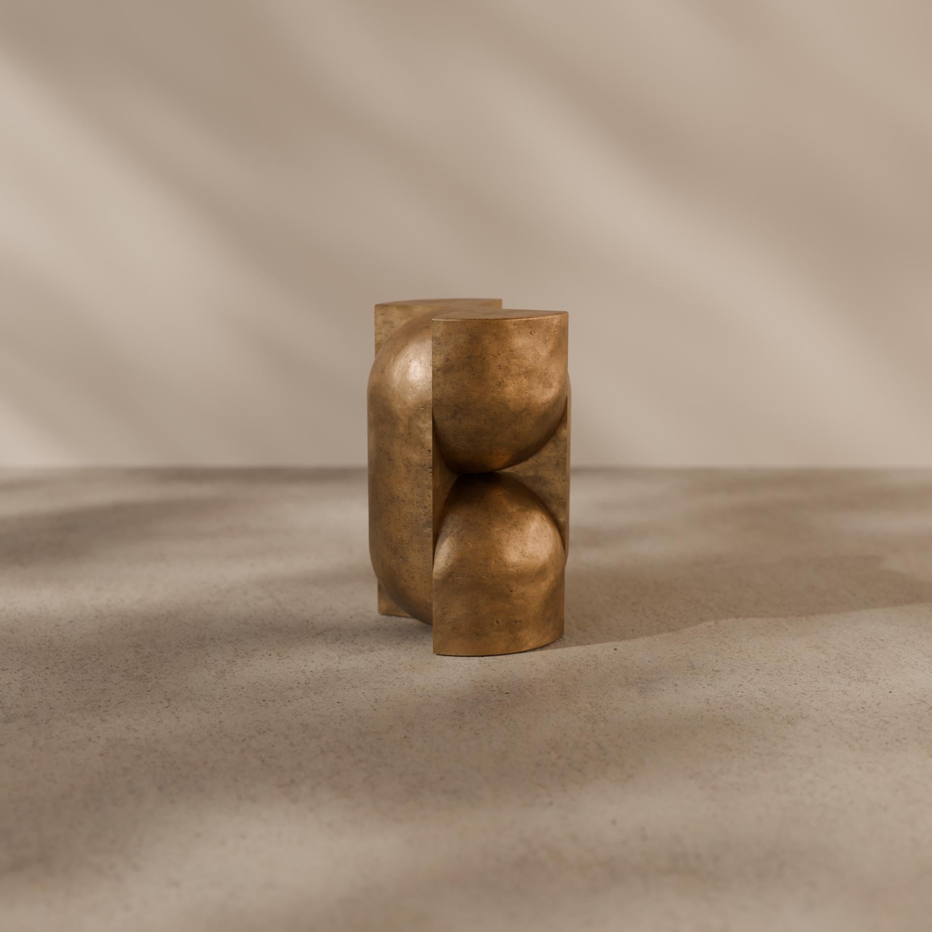 Introducing the Capsule Pedestal, a sculptural piece inviting a tactile connection. Cast in bronze, its subtle contours draw inspiration from space-age design and vintage aesthetics, infusing your space with a touch of nostalgic elegance.

Designed