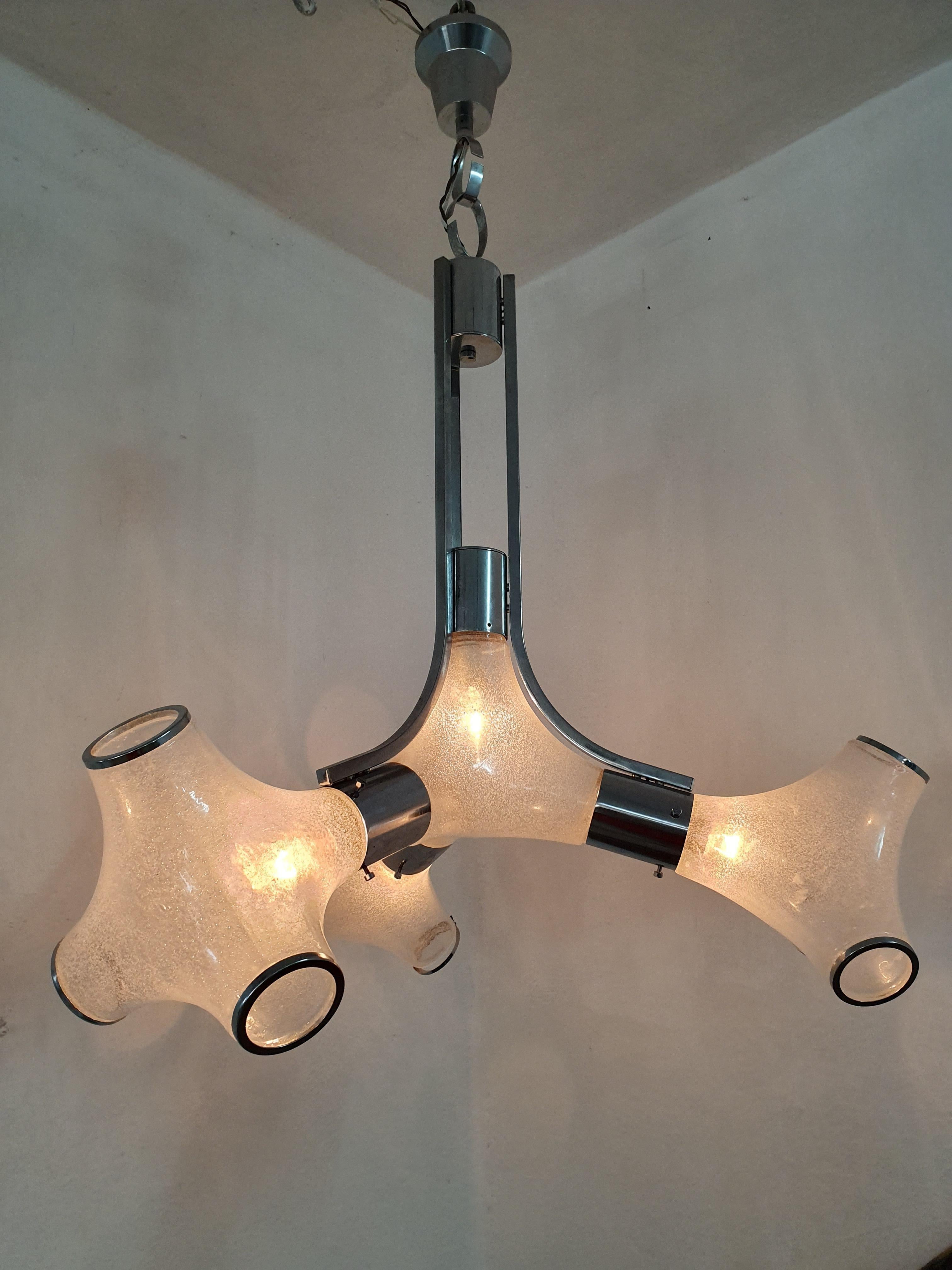 Mid-Century Modern four-light chandelier in chrome and Murano glass in the 