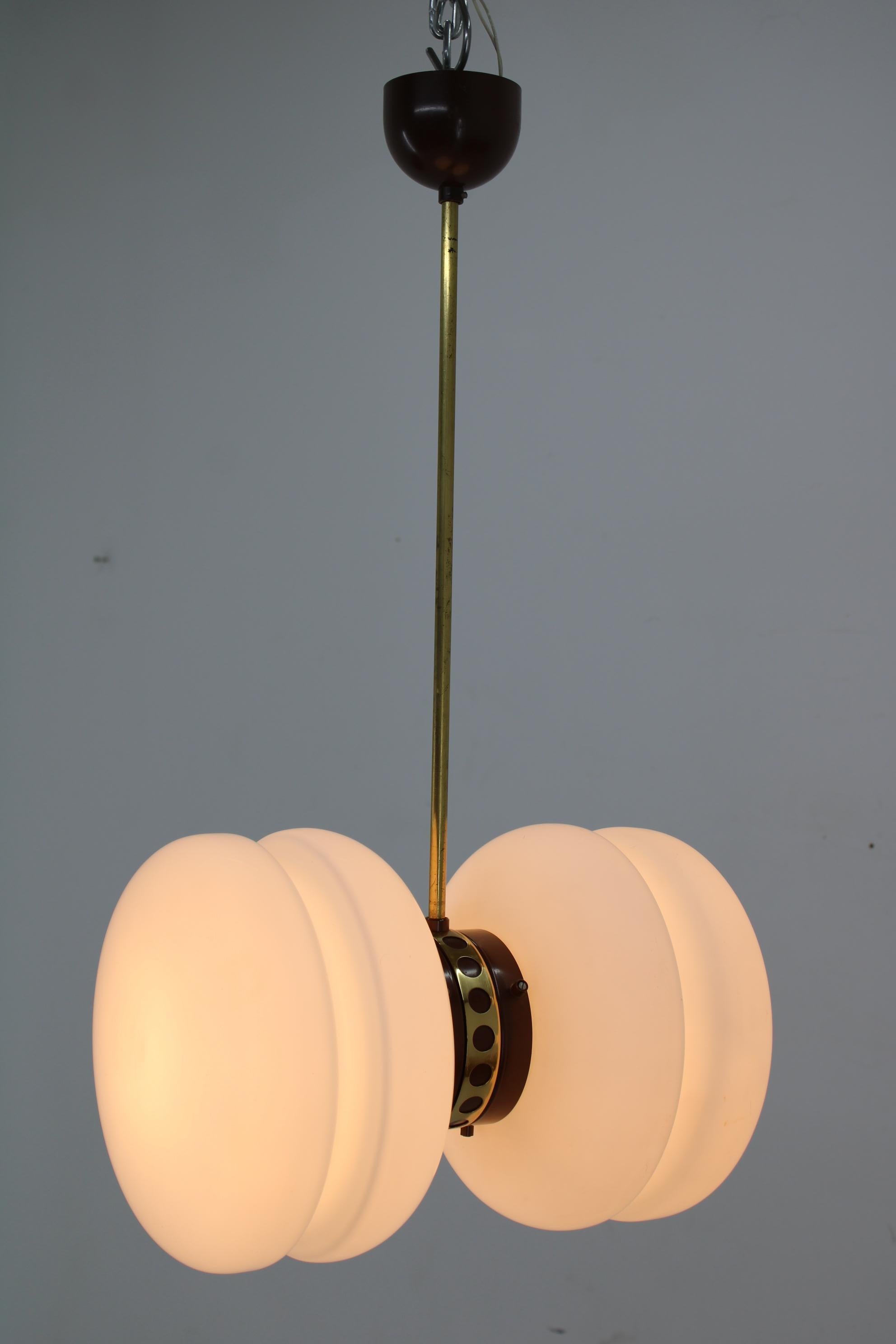 Space Age chandelier made in Czechoslovakia in 1960s.
Very good original condition.
2x40W, E25-E27 bulbs
US wiring compatible