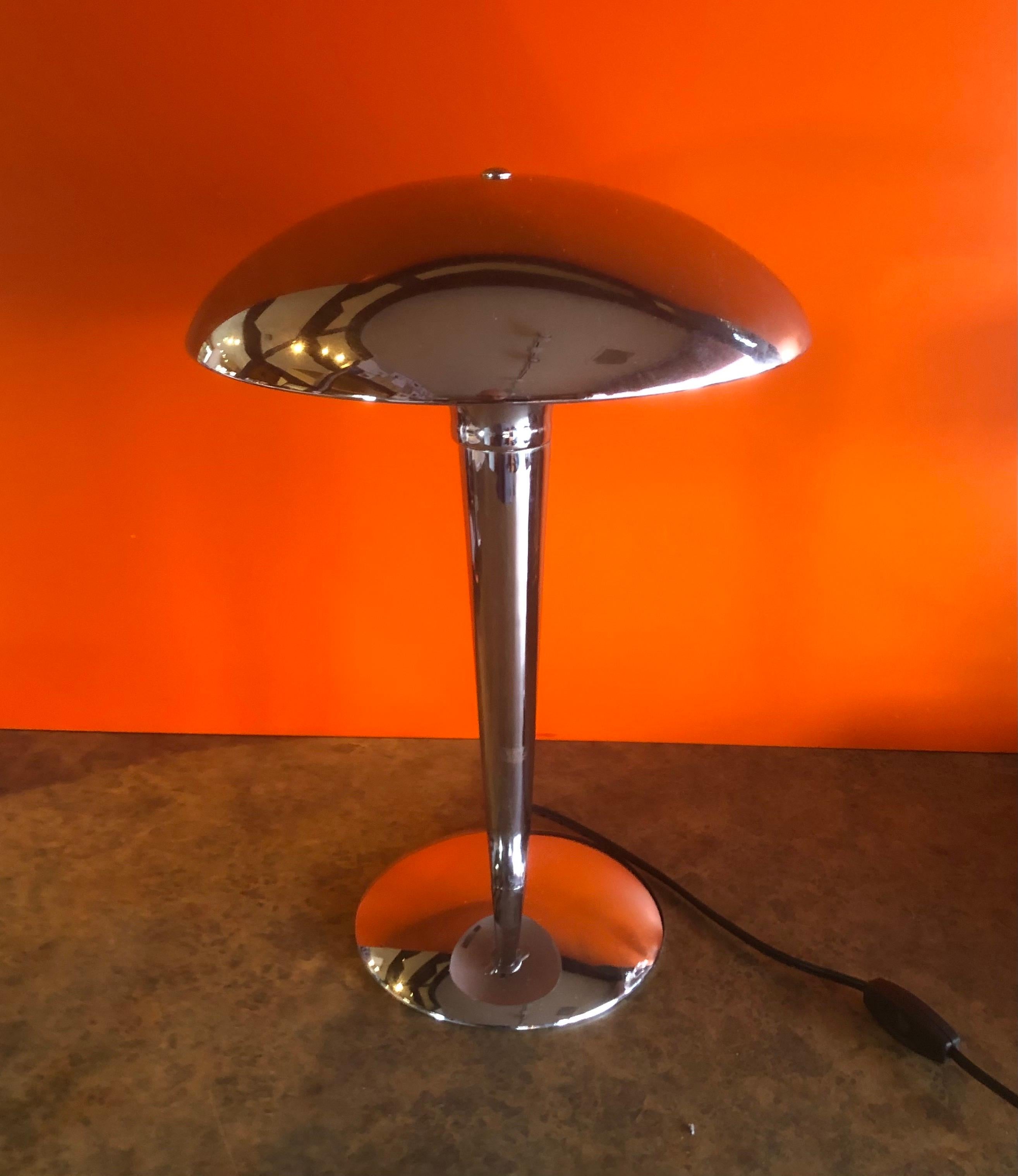 Space Age chrome table lamp with mushroom shade, circa 1970s. The lamp is American made and in very good vintage condition, it measures 13