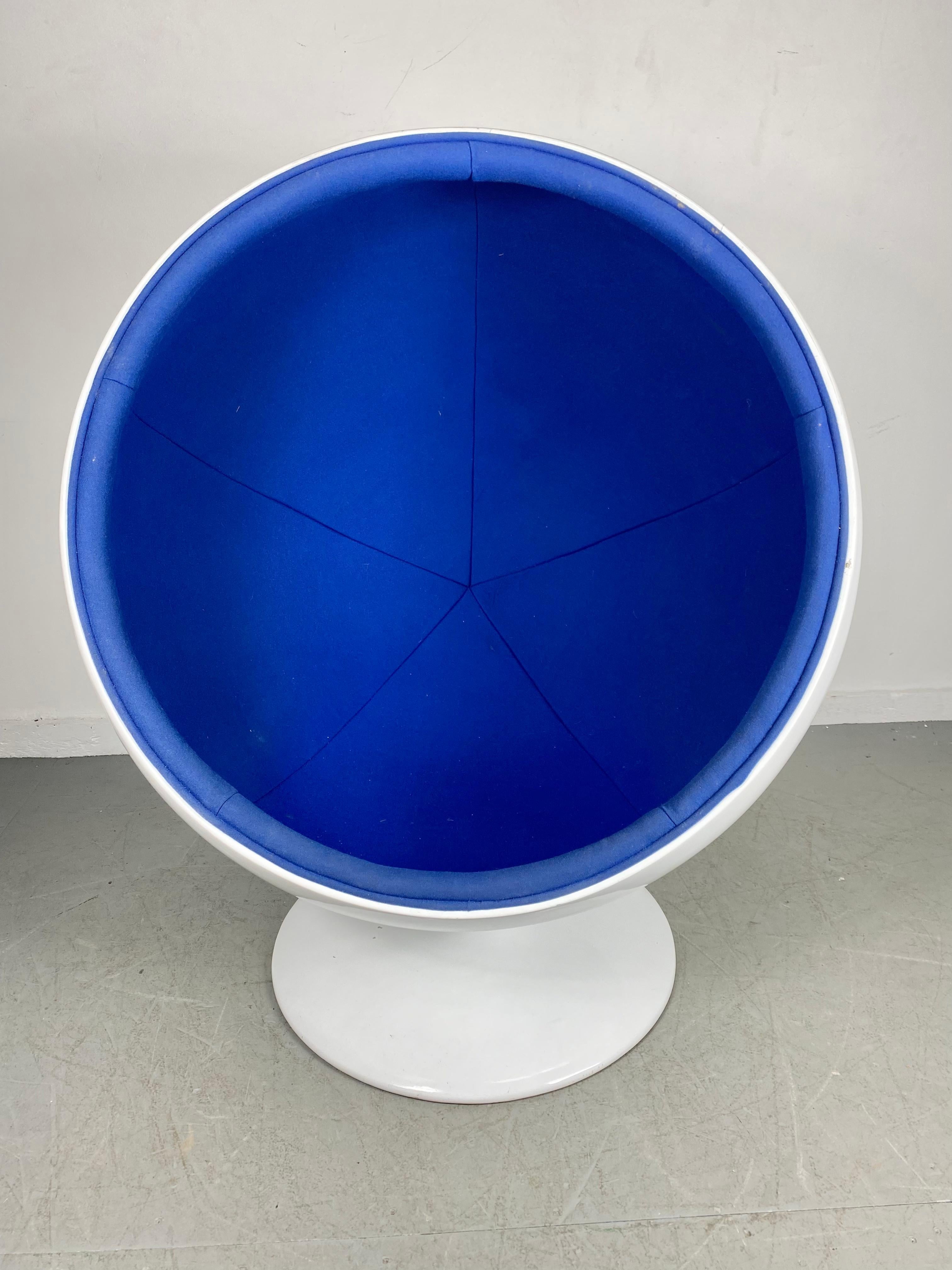 Space Age Contemporary fiberglass ball / globe chair style of Eero Aarino. Older version, not a cheap reproduction, heavy fiberglass construction, beautiful royal blue wool fabric interior, 360% swivel. Minor edge chip (see photo) Hand delivery