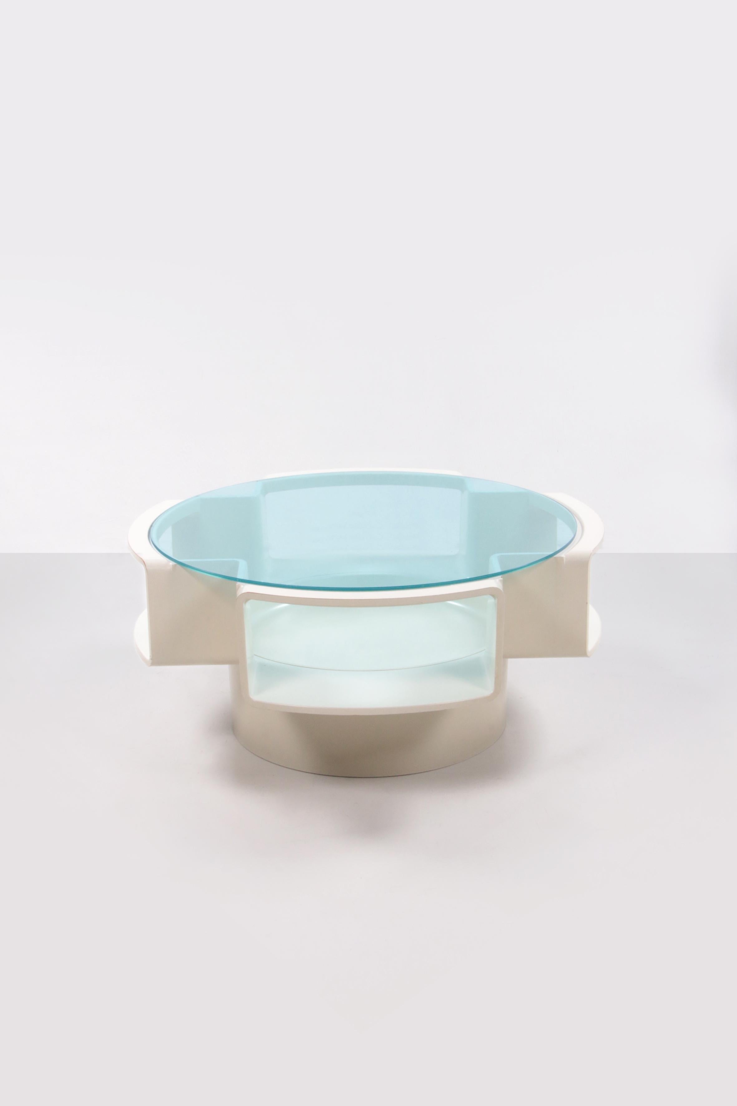 Space age design UFO coffee table by Jean Maneval for Mobilier de France, 1970s
This is a beautiful Spage Age coffee table with beautiful blue glass. This special item is a design by Jean Maneval.

Producer: Furniture de France.

The tableau in