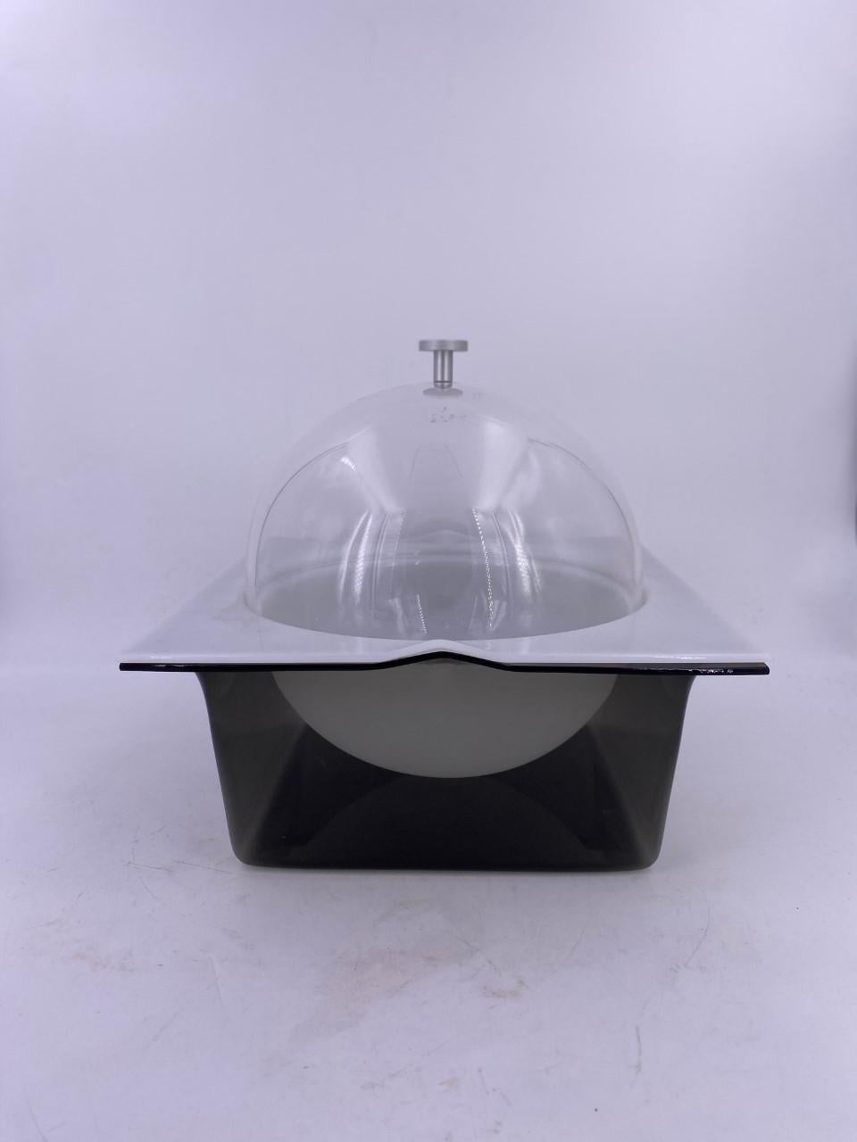 Beautiful and unique Space Age dome ice bucket, with white plastic removable insert for easy cleaning. Sleek and glamorous. Minimal in design and high in style.