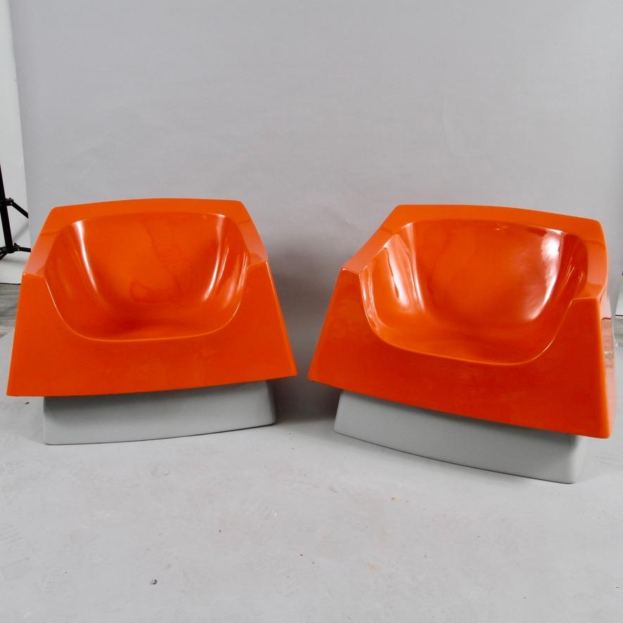 Looks like something straight off the set of Star Trek! The Vecta Group in Dallas, TX made these beautifully molded fiberglass office chairs around 1973. A medium gray base sets off the glossy orange fiberglass surrounding it. A super rare set.,