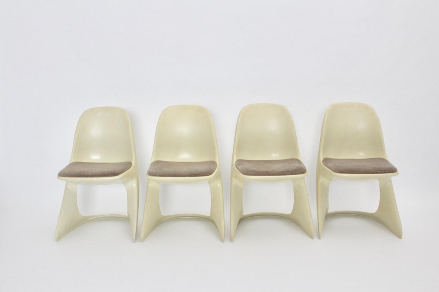 German Space Age Four White Vintage Plastic Dining Chairs Alexander Begge, 1971 For Sale
