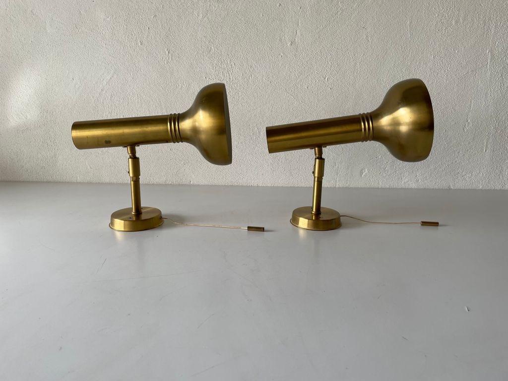 Rare Space Age gold metal pair of sconces by Cosack, 1970s, Germany

Very elegant and Minimalist wall lamps

Lamps are in very good condition.

These lamps works with E27 standard light bulbs. Each lamp works with 1 light bulb. Max 40 W
Wired