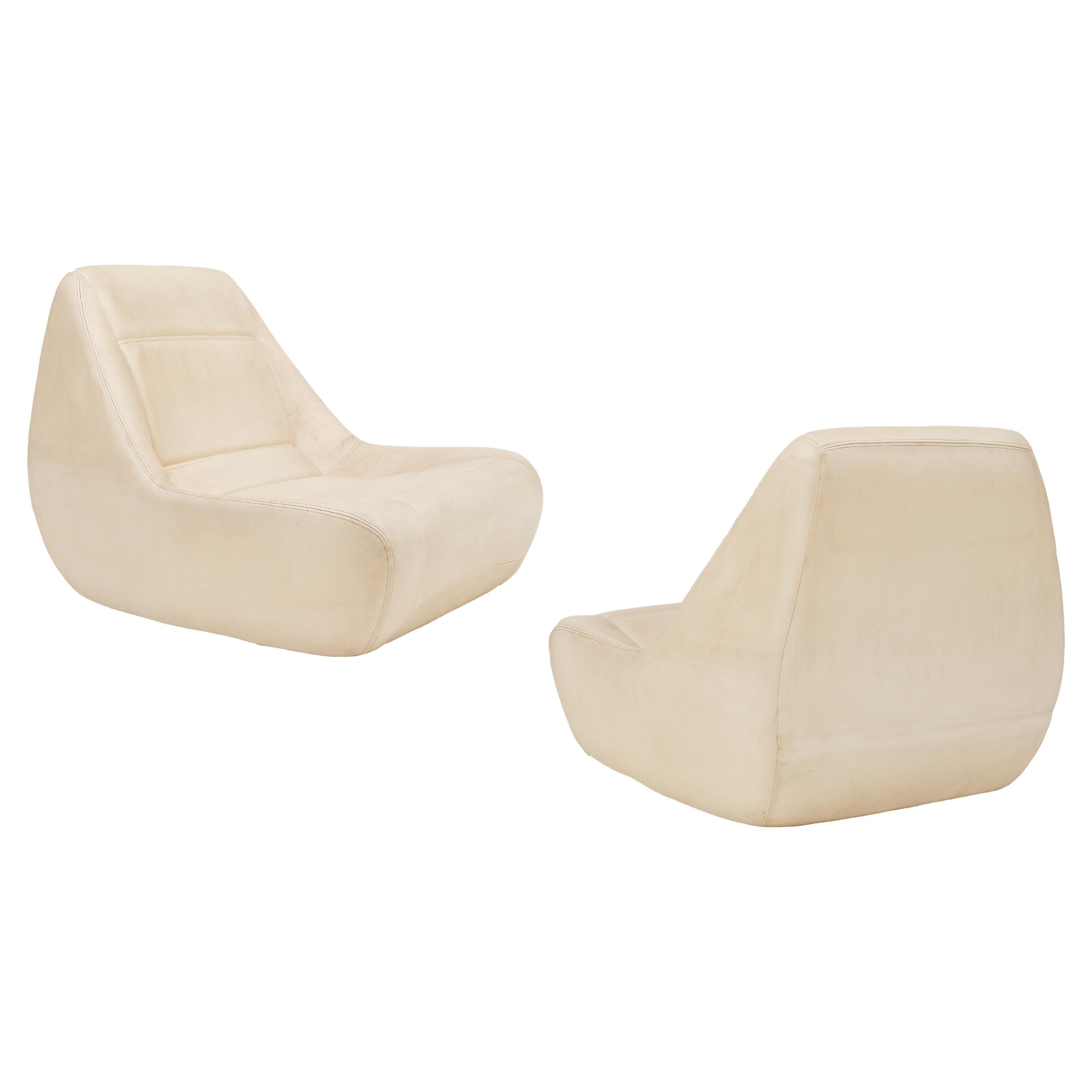 Incredible and comfortable space age lounge chairs. Would be incredible in a media room, kids room. Cool and Chic vibe. Imported from France. Made in 1970's. Amazing as is or can be reupholstered.