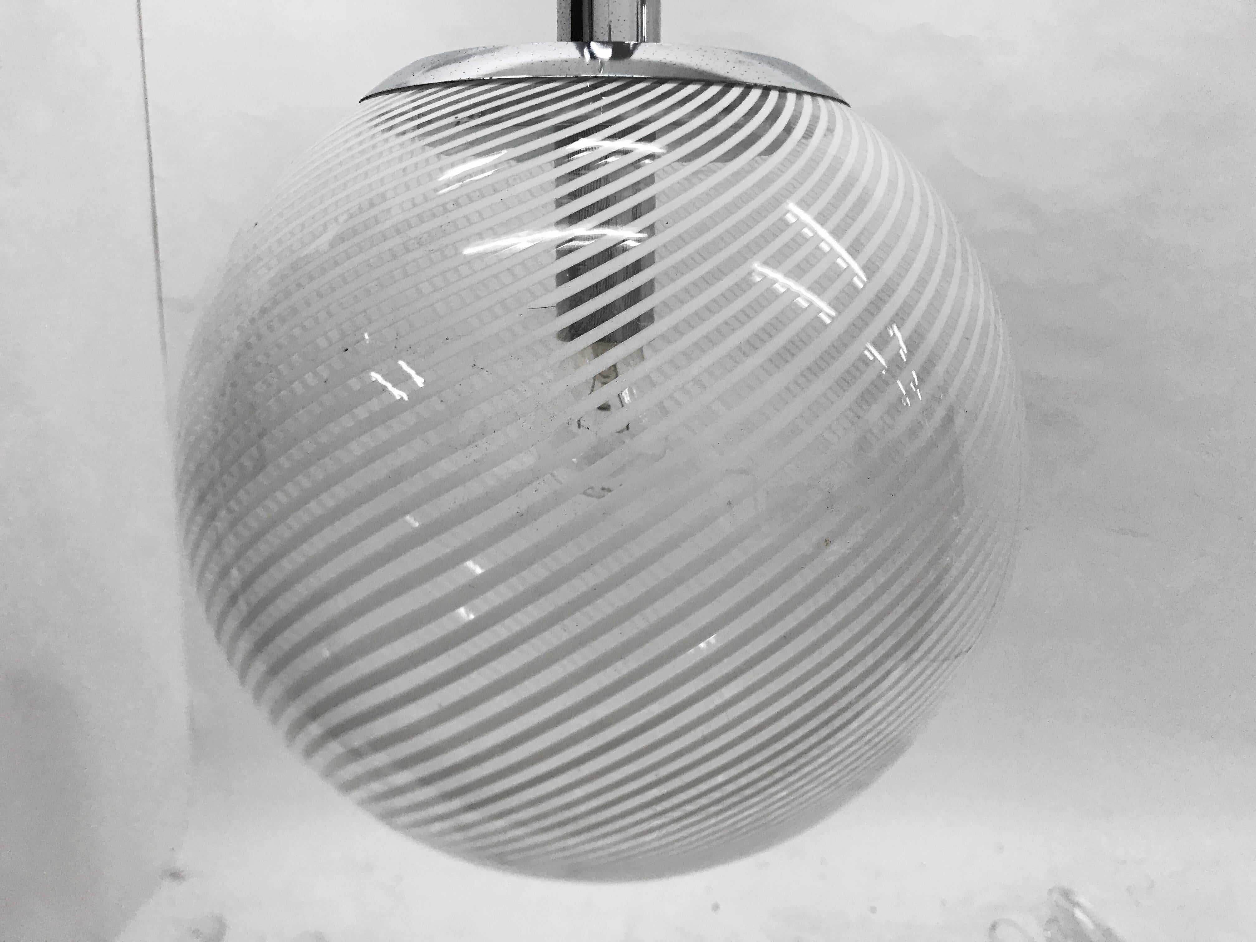 Huge Space Age Italian Venini pendant, glass is in perfect condition, chromium part has some rust as shown in the photos.
It works with both 110 and 220 Volts and need regular e27 bulb.