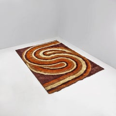 Space Age Italian short pile brown carpet, with orange and beige decoration 1970