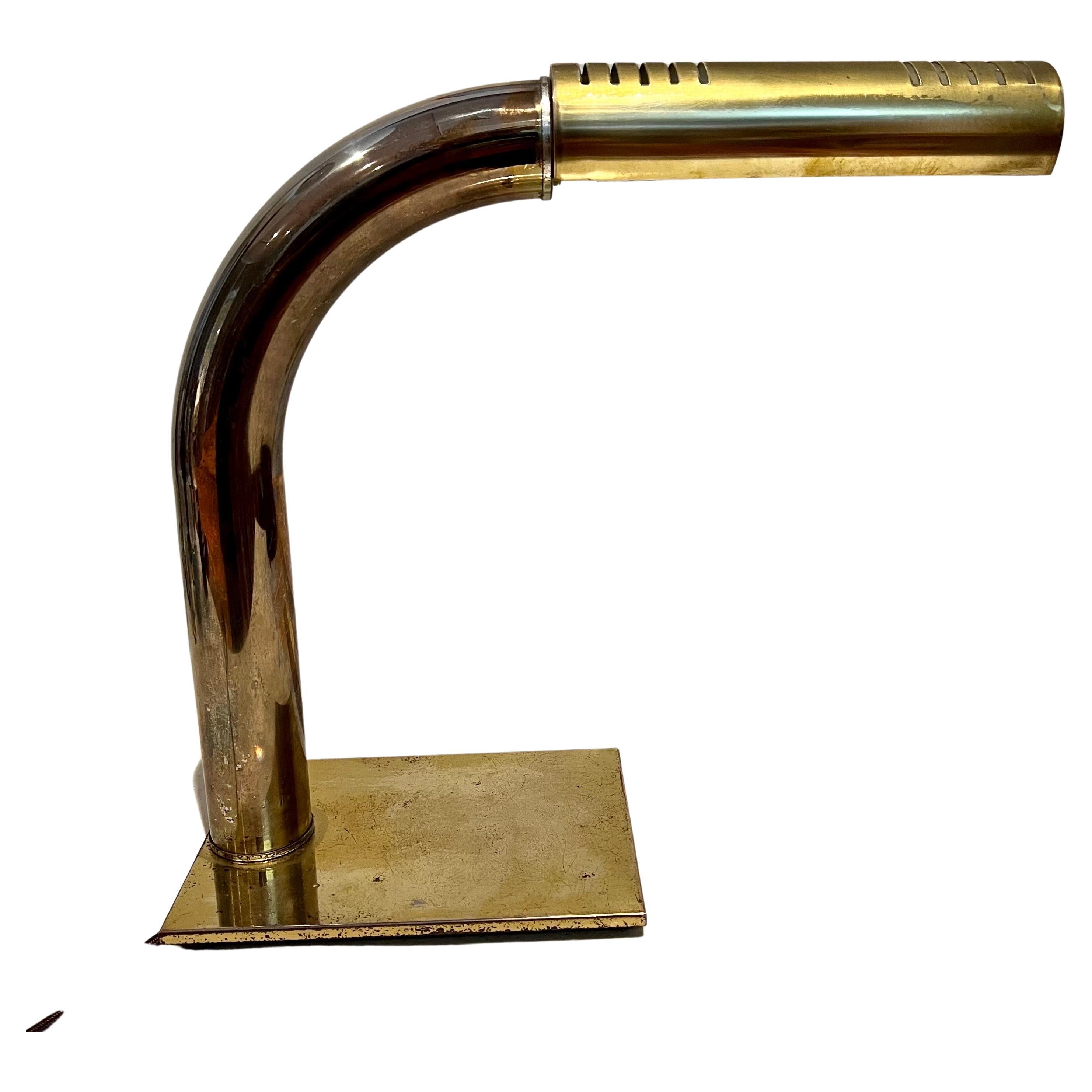 A very rare patinated brass & chrome table desk lamp designed by Jim Bindman for Rainbow lamp company, we have rewired and polished the lamp it shows wear on the finish due to age, it can be professionally polished but we are selling it with its
