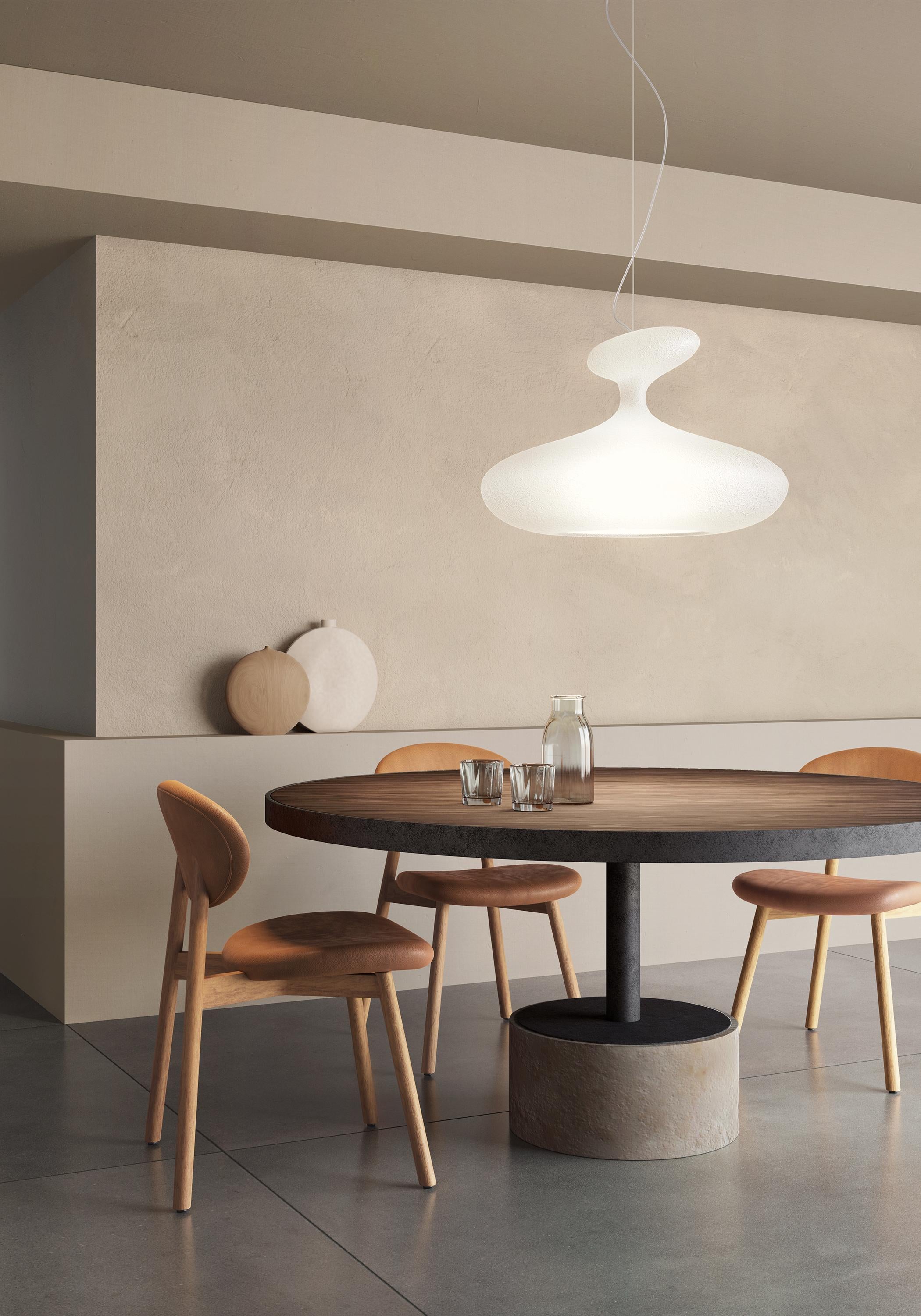 E.T.A. sat white finish

The material is transformed and turned into a light. Physical presence and abstract concept for a light with an original aesthetic look. Fluid, irregular shapes create an innovative, eye-catching equilibrium. A highly