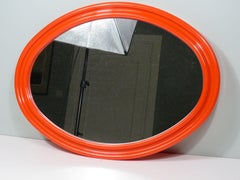 Space Age large orange oval mirror 1960s in the style of Guzzini, V.Panton