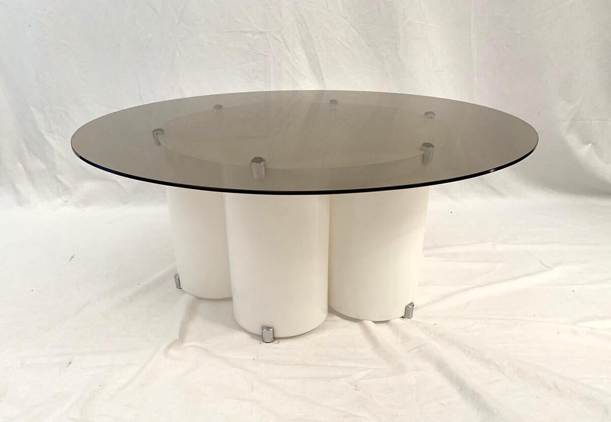 Space age living room table in white plexiglass.