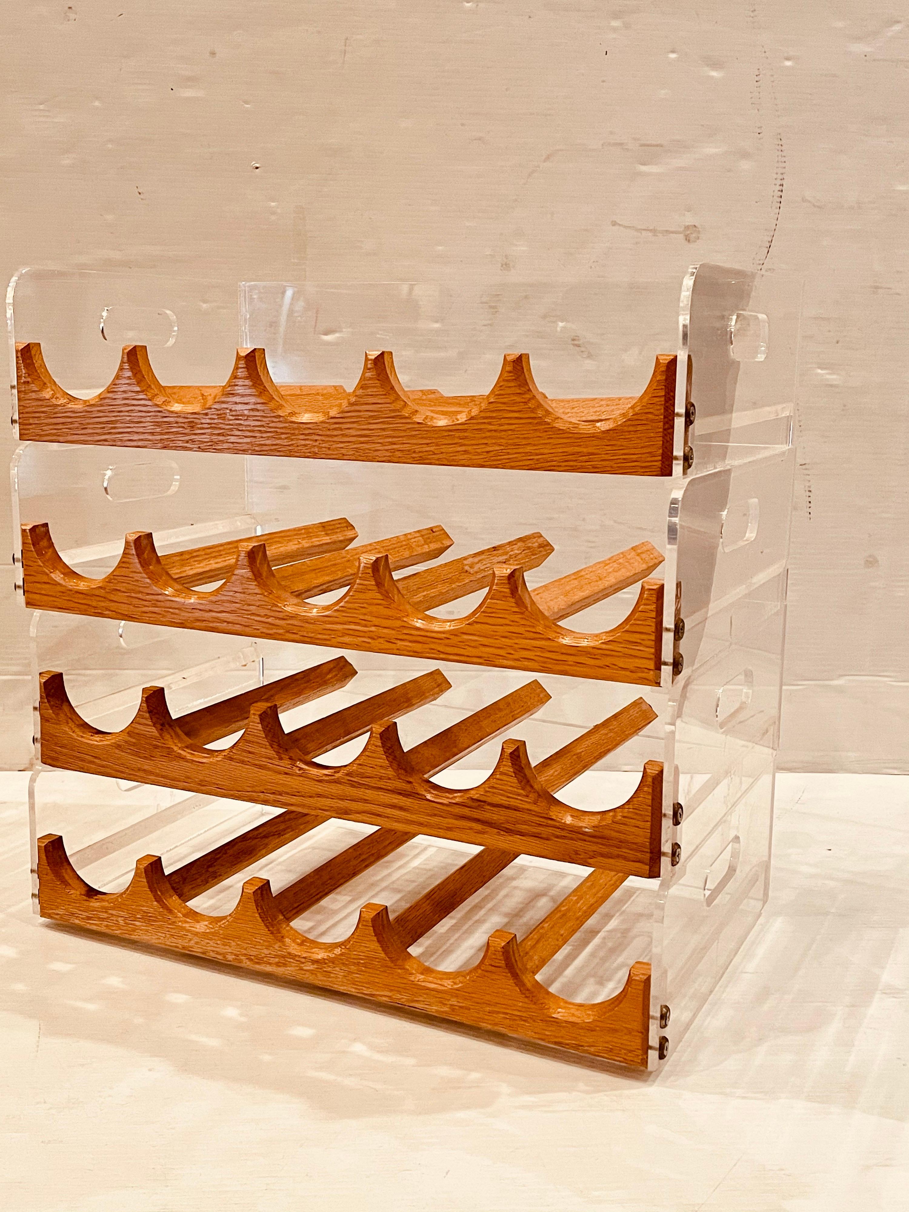 American Space age, Postmodern lucite and oak 20 bottle capacity stackable wine rack. Versatile elegant and simple. Each carrier its 4.75