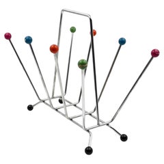 Space age magazine rack, in the manner of Charles and Ray Eames, Italy 1970s