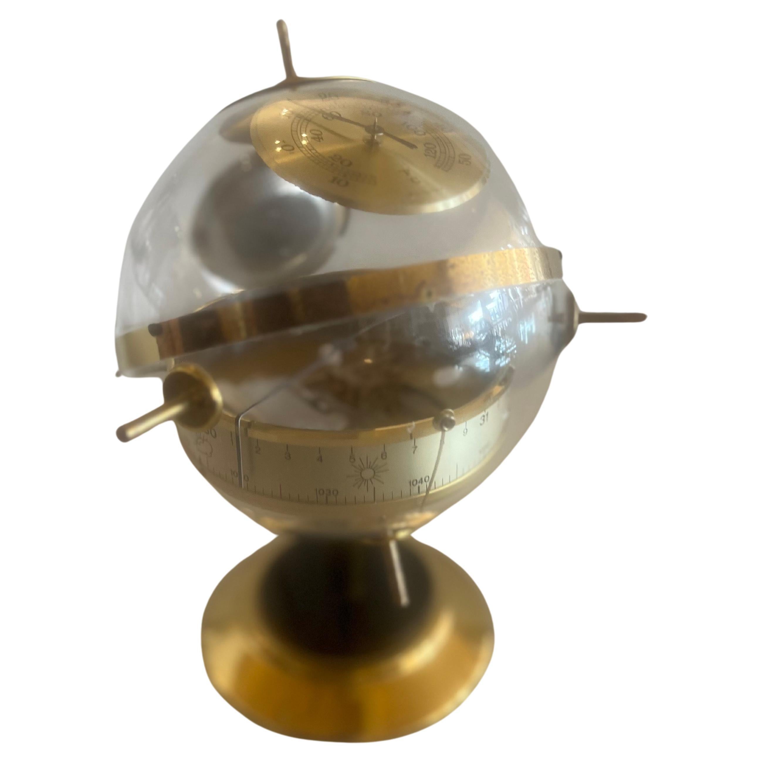 Very cool space age brass and lucite small globe weather station , barometer made in West Germany , Post war piece.