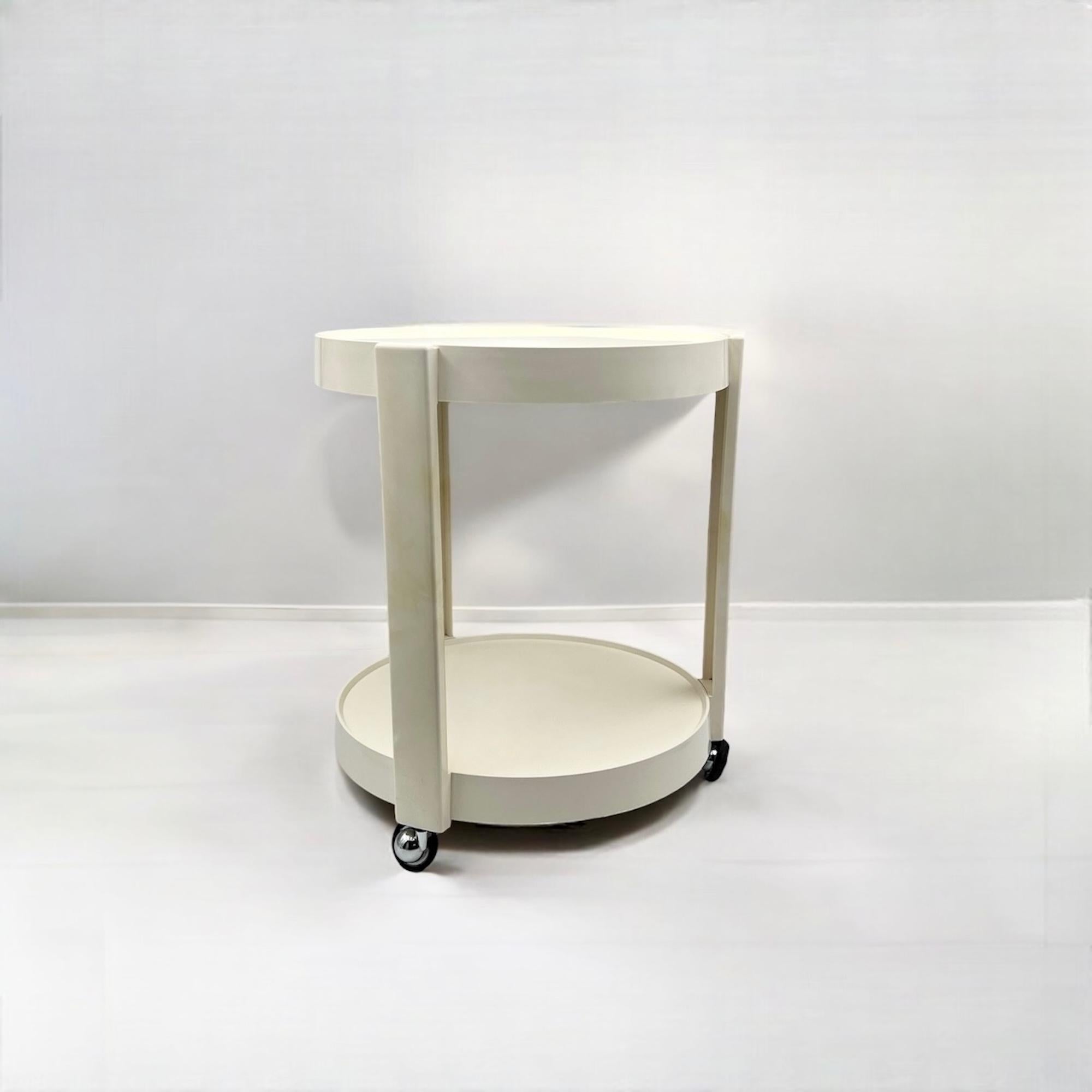 Rare and distinctive Space Age Mobile Bar, a classic design crafted by Kastilia in Italy. This mid-century modern piece perfectly encapsulates the futuristic vibes of the Space Age era, featuring a sleek off-white color and rounded shapes that evoke