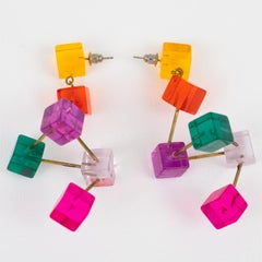 Pendientes perforados de lucita atómica multicolor Space Age