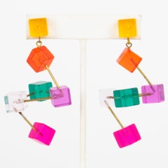 Pendientes perforados de lucita atómica multicolor Space Age