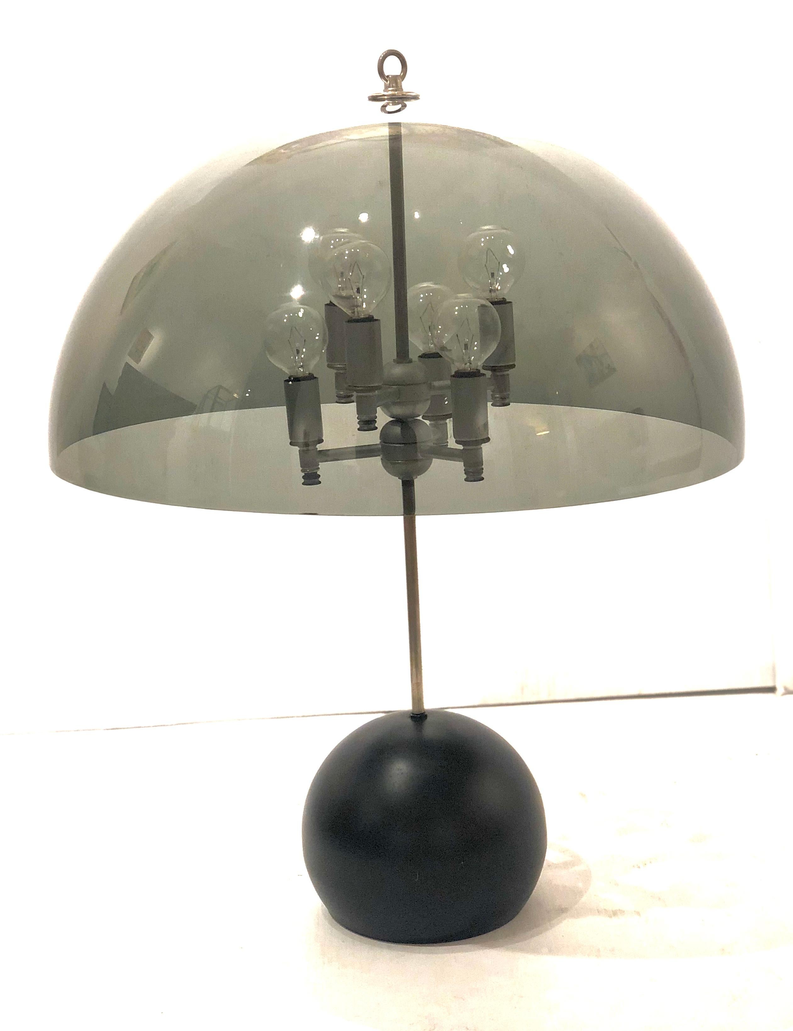 Rare mushroom lamp with smoke Lucite shade circa 1970s, American made chrome and black enameled base the lamp has been rewired, and works great, takes up to forty watts per light bulb, with capacity for six lightbulbs. We have polished and clean the