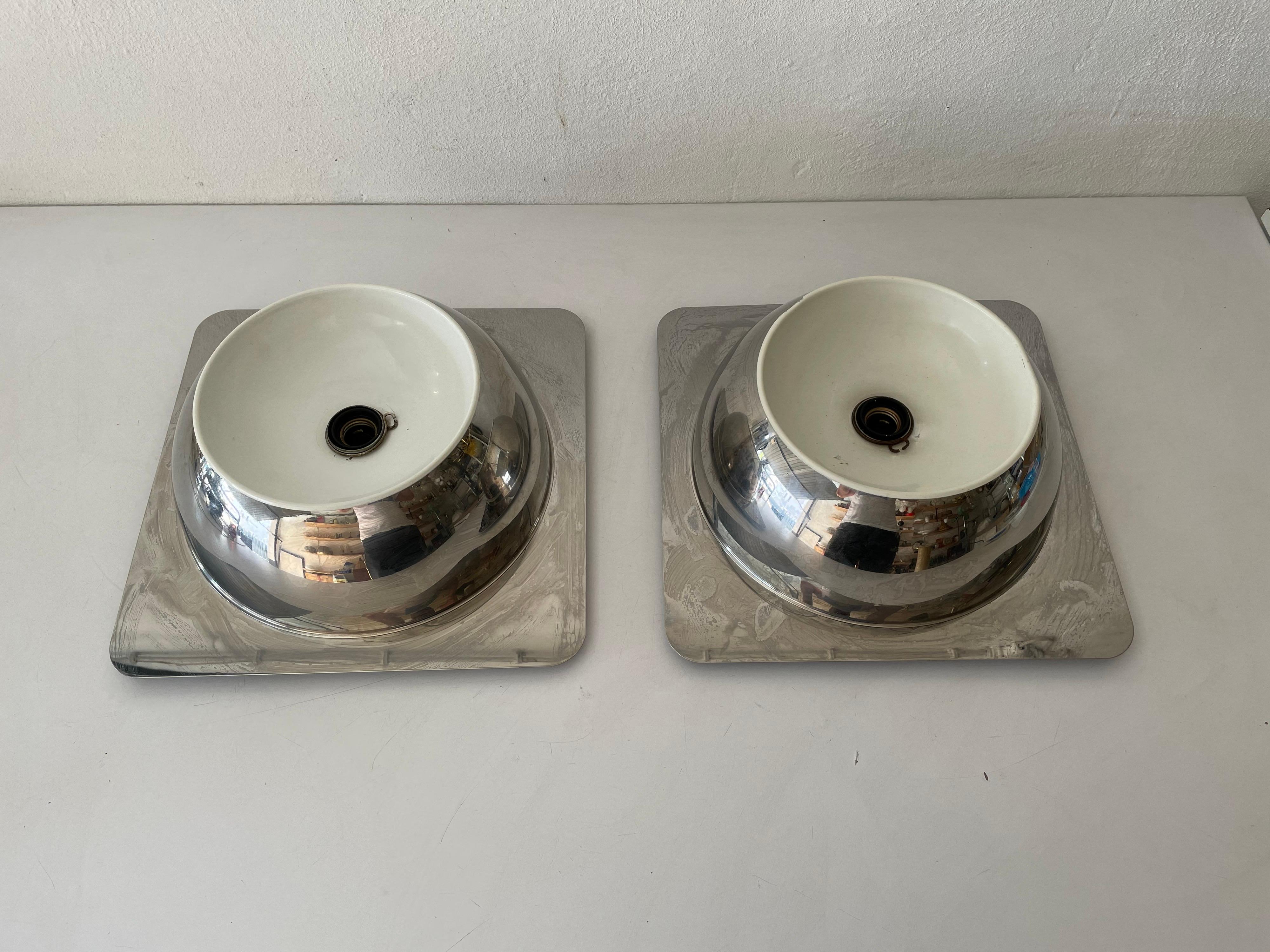Rare Space Age pair of chrome sconces or ceiling lamps by Reggiani, 1970s, Italy

Very elegant and Minimalist wall lights

Lamps are in very good condition.

These lamps works with E27 standard light bulbs. Each lamp works with 1 light bulb.