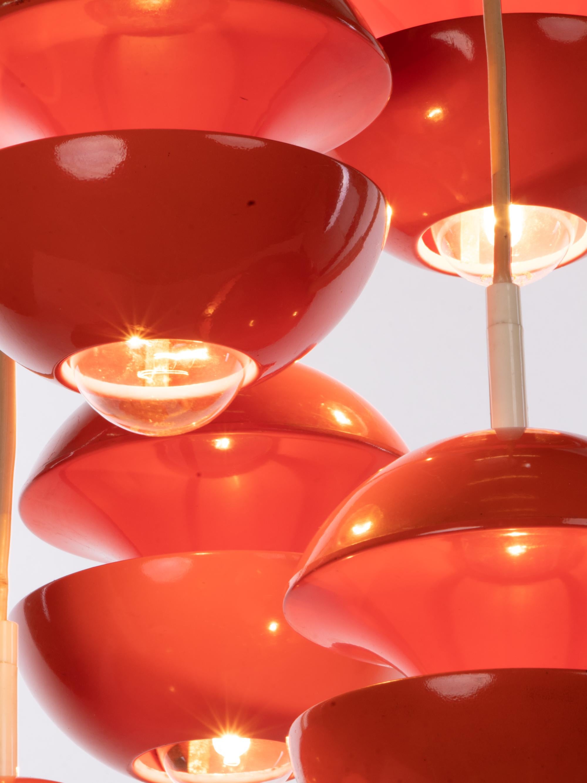 Elegant orange-red Space Age tulip pendant lamp designed by Klaus Hempel. Manufactured by Kaiser Lighting, Germany in the 1970s. 

Awarded design: iF Product Design Award in 1972. 
Measures: diameter 13.7