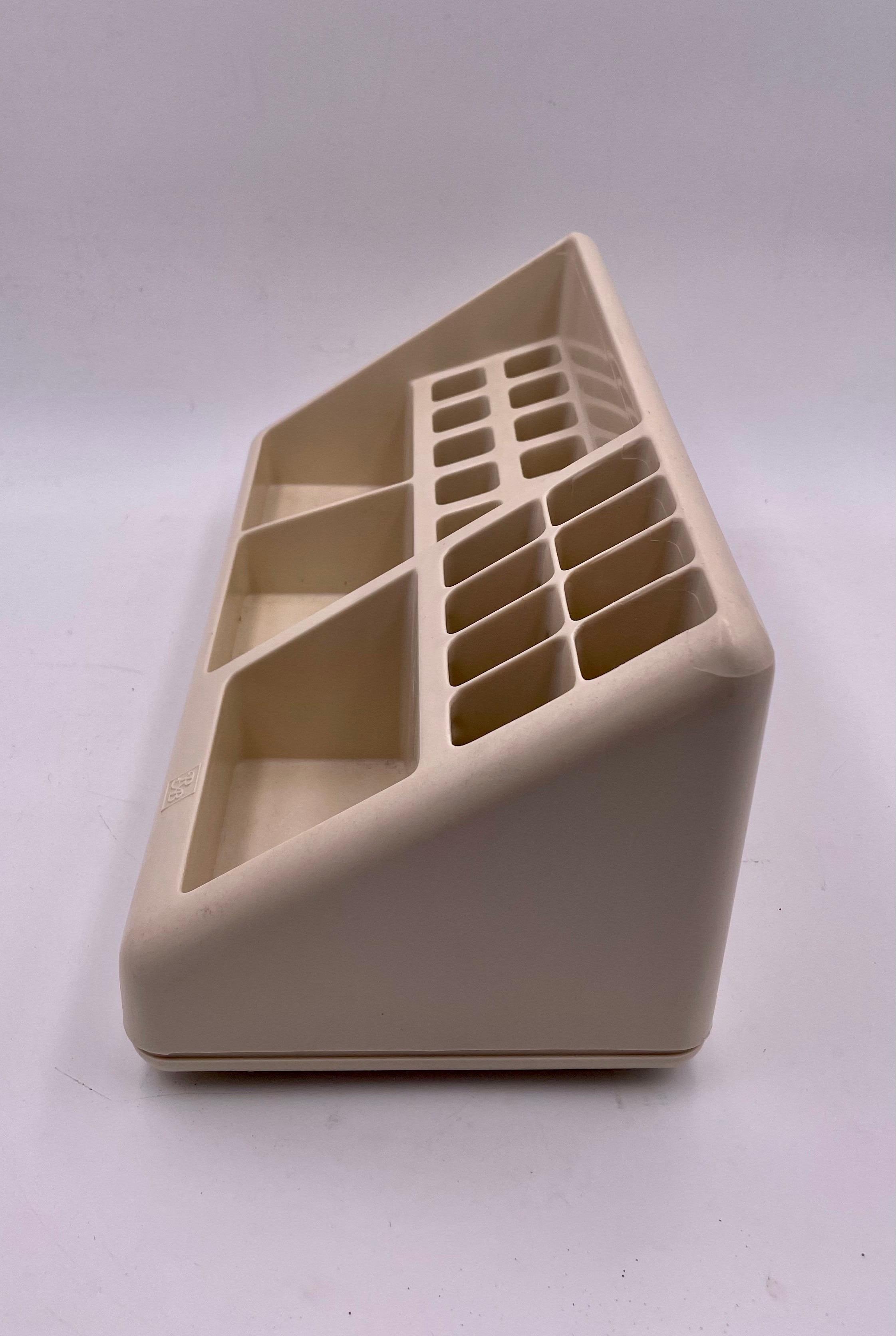 Great design on this space-age in plastic with a cream color desk caddy organizer, circa 1980's versatile and functional.
