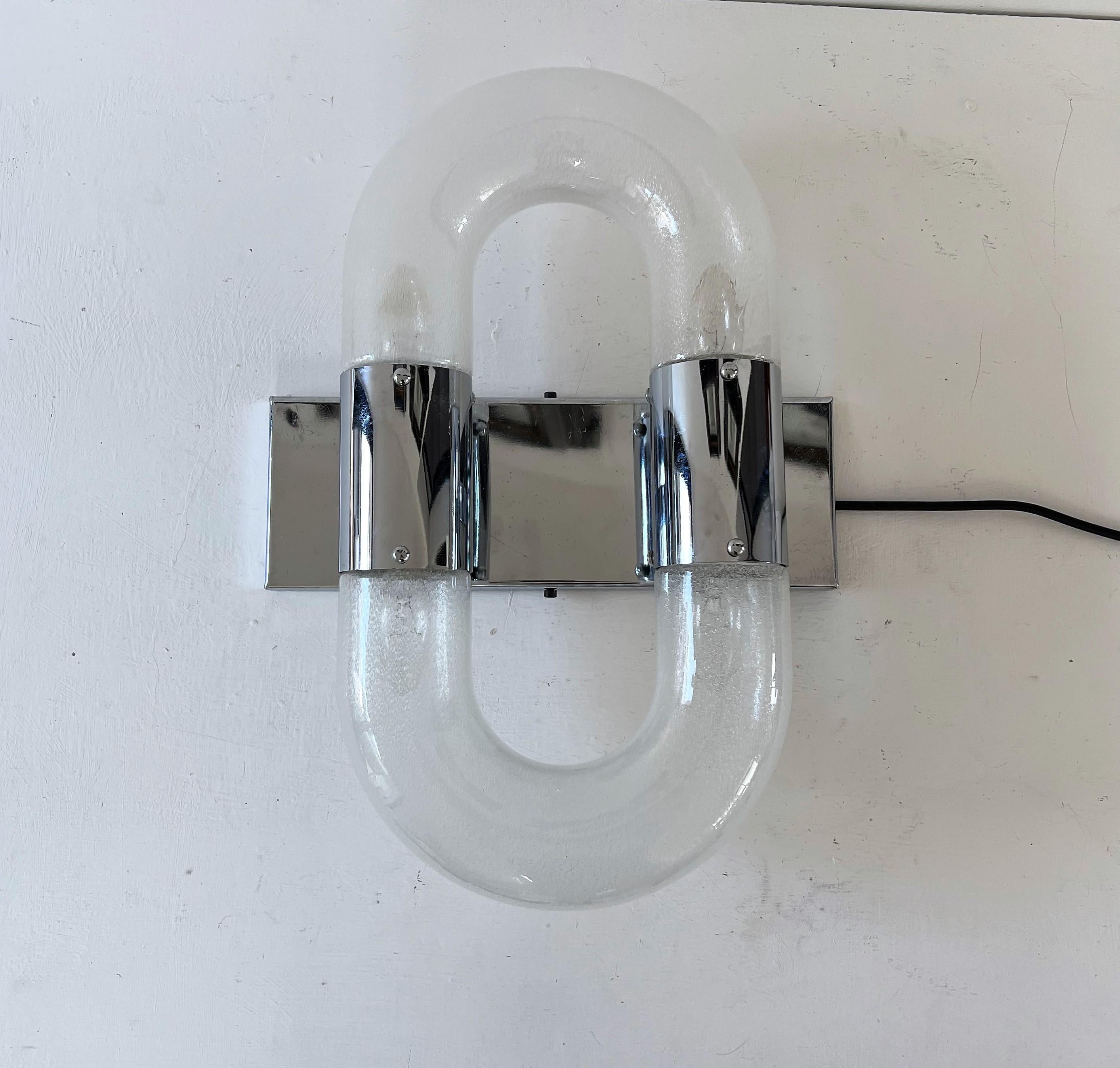 Space Age four-light sconce designed by Aldo Nason, circa 1970 in Murano glass in the 'Pulegoso' technique and a chromed metal hardware.
We have two available, priced individually.