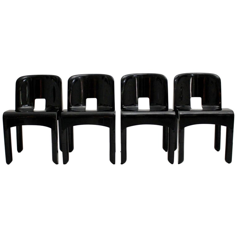 E Age Set Of Four Black Vintage Plastic Dining Chairs By Joe E Age Set Of Four Black Vintage Plastic Dining Chairs By Joe Colombo Italy For