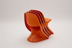 Space Age Plástico Cuatro Sillas Apilables Vintage Naranja Niños 1970s Casalino