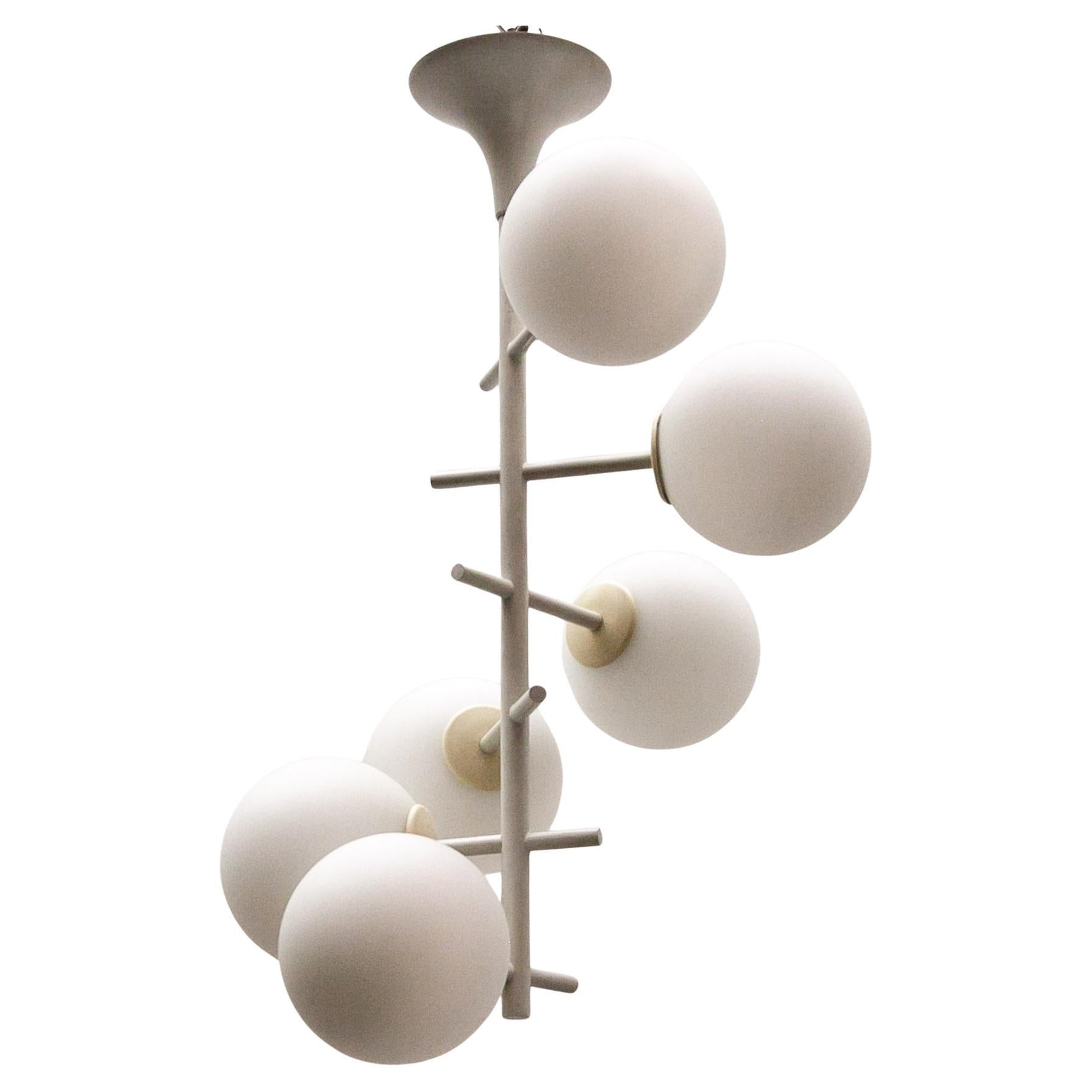 Rare early Sputnik lamp with six opaline glass shades. With a highly refined and streamlined design, this lamp exemplifies the superior craftsmanship of the 1950s or 1960s. The metal white coated frame, combined with the six white opaline glass