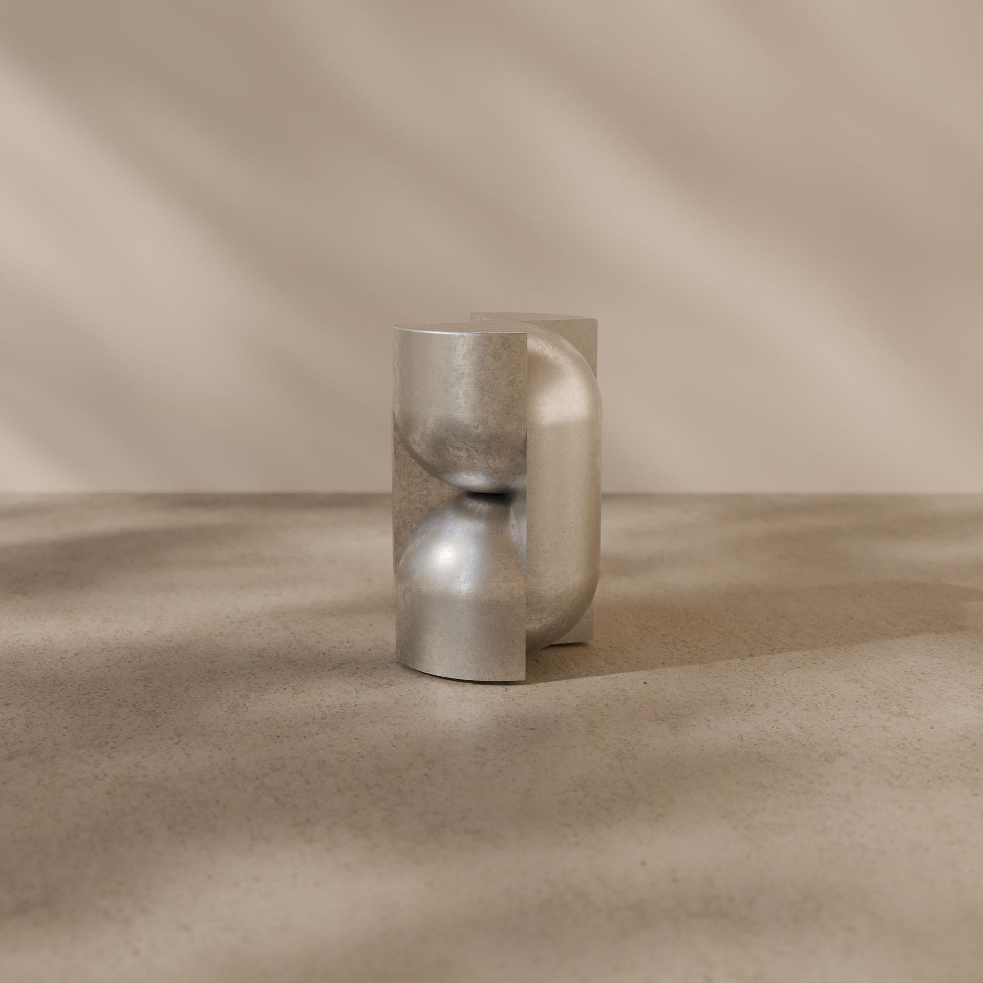 Introducing the Capsule Pedestal, a sculptural piece inviting a tactile connection. Cast entirely in solid aluminum, its subtle contours draw inspiration from space-age design and vintage aesthetics, infusing your space with a touch of nostalgic