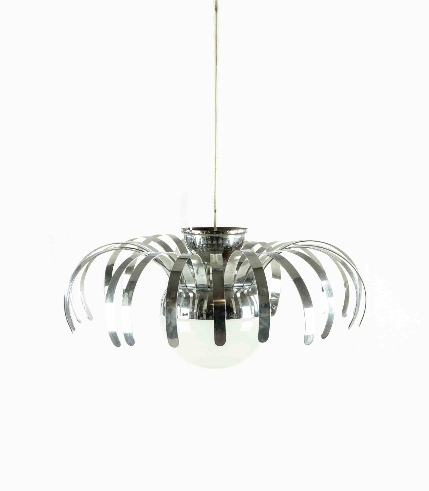 Space age spider lamp is a contemprary design lamp realized in the half of 20th Century.

A unique table lamp entirely realized with a chrome spider shape structure.

Mint conditions

Amaze your guest with this amazing lamp!
