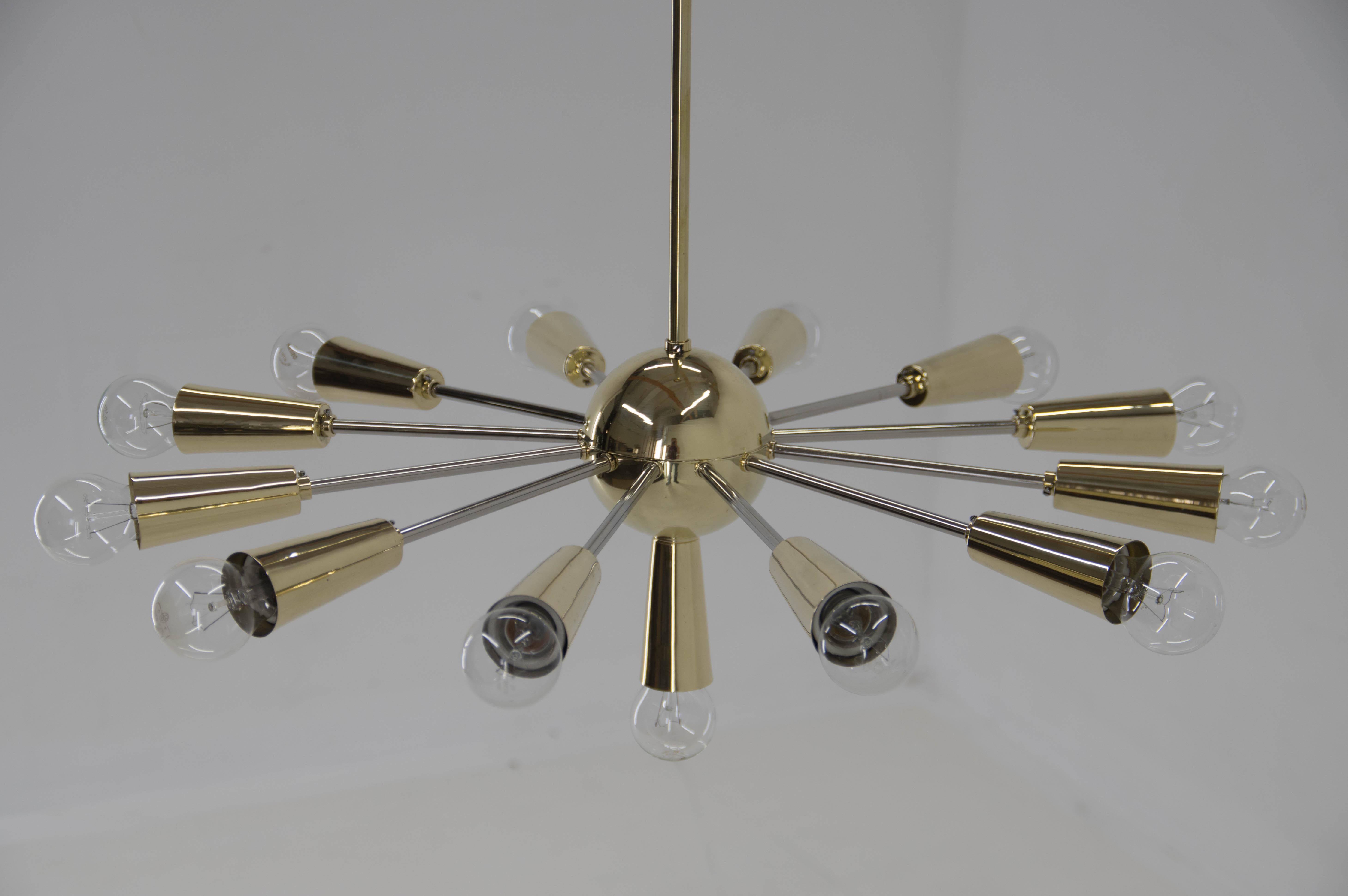 Rare Mid-Century big Sputnik style chandelier.
Made in Czechoslovakia in 1960s.
Cleaned, polished, rewired:
13x40W, E25-E27 bulbs
Excellent condition
US wiring compatible.